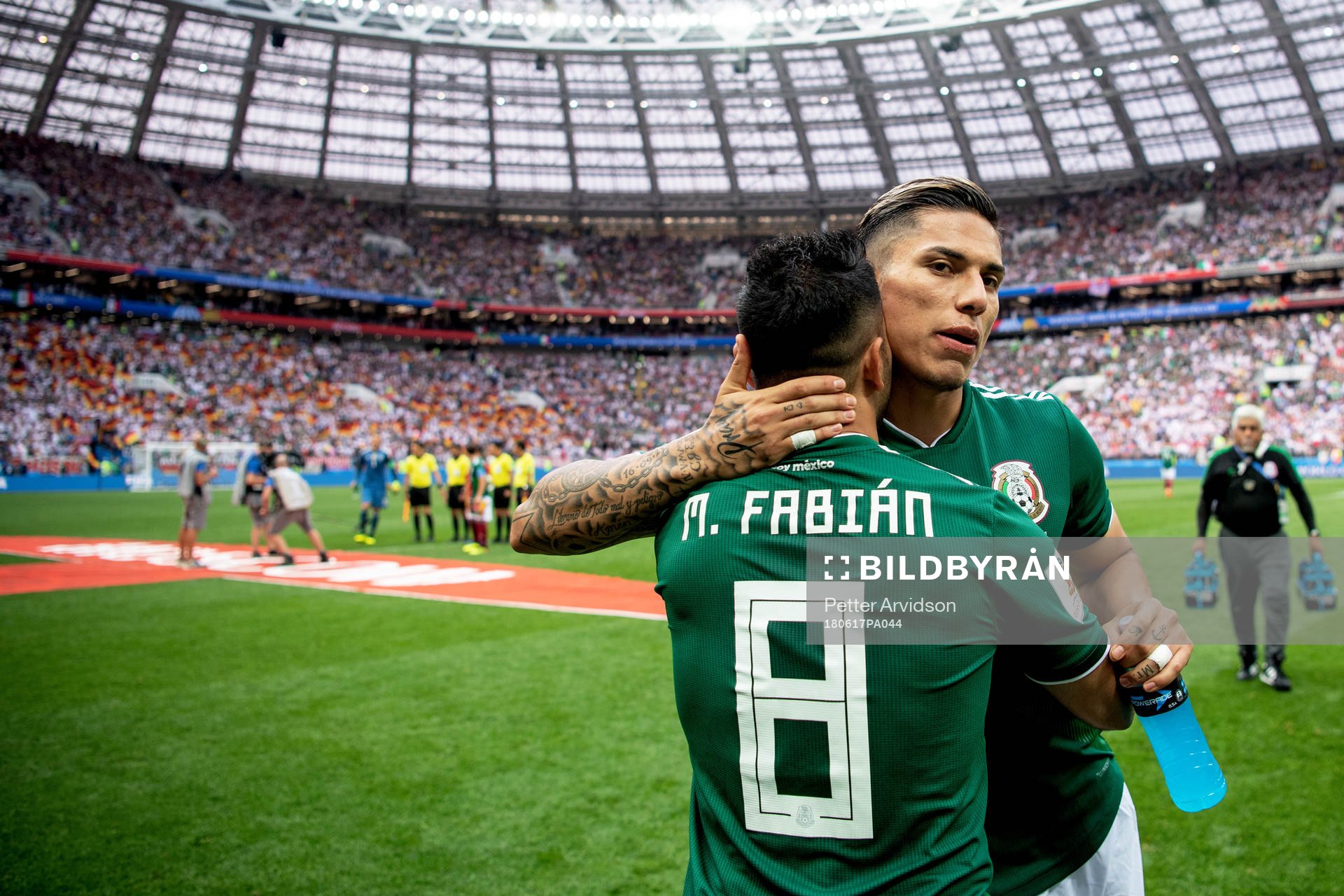 Carlos Salcedo and Marco Fabian of Mexico