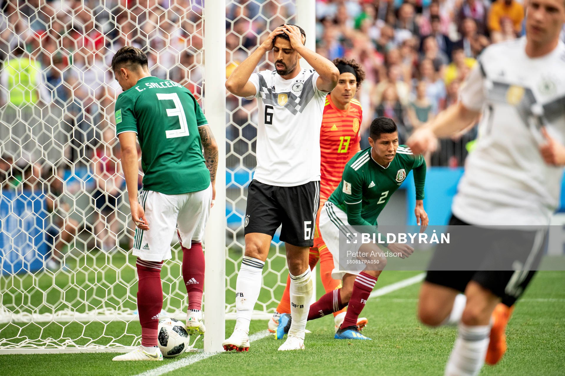 Sami Khedira of Germany looks dejected