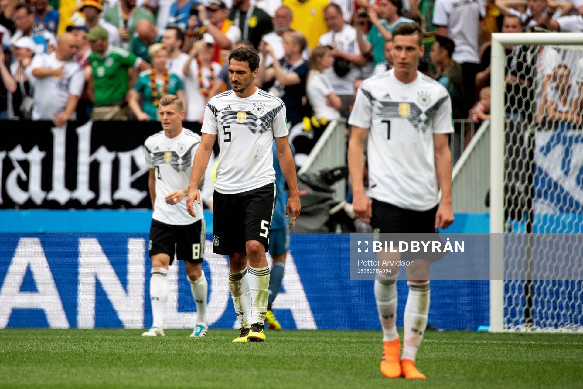 Mats Hummels and Julian Draxler of Germany looks dejected