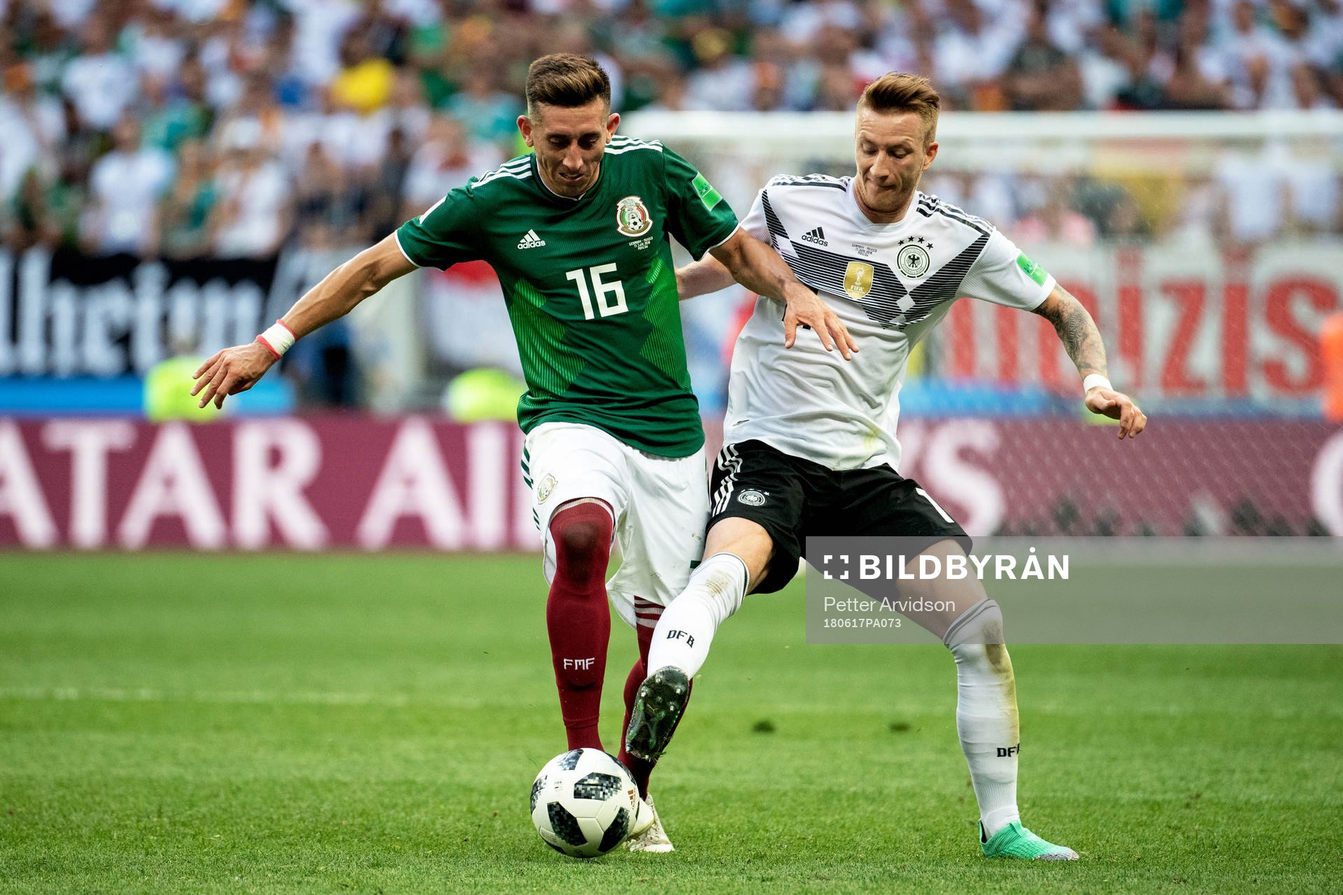 Hector Herrera of Mexico and Marco Reus of Germany