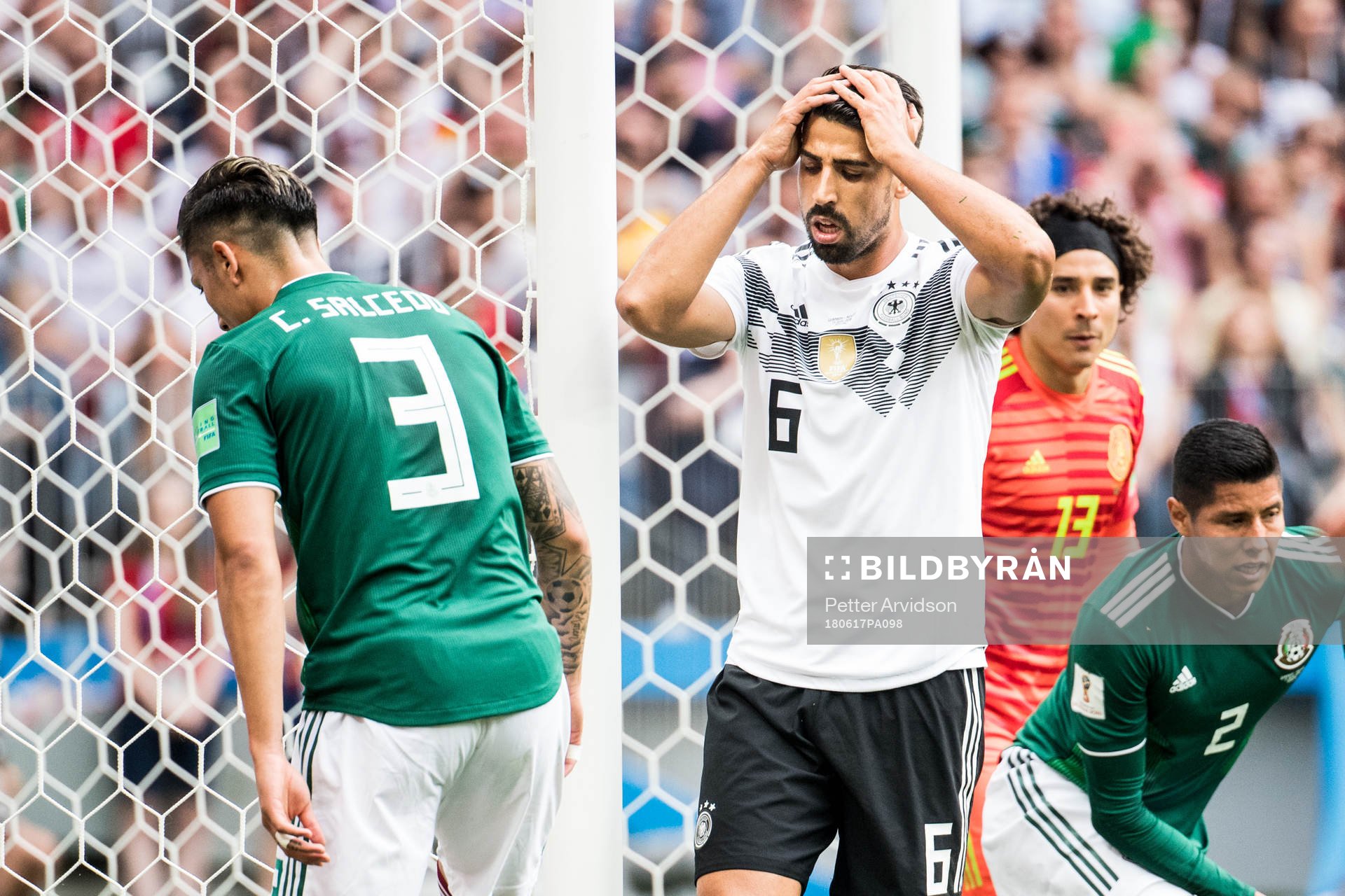 Sami Khedira of Germany looks dejected