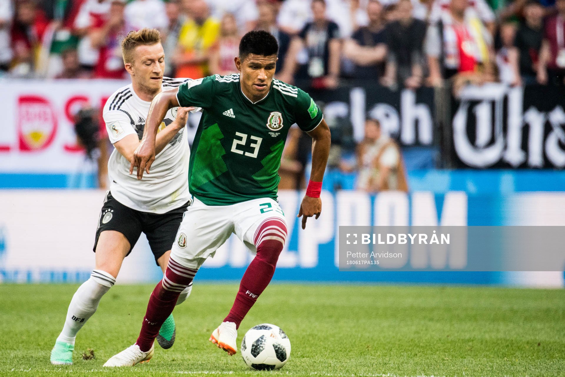 Marco Reus of Germany and Jesus Gallardo of Mexico