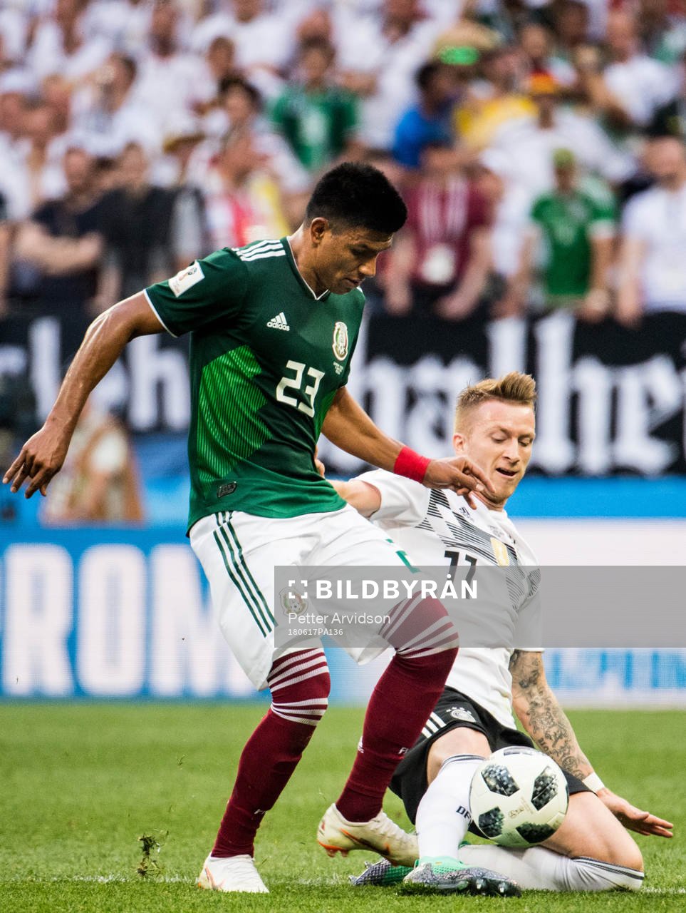 Marco Reus of Germany and Jesus Gallardo of Mexico