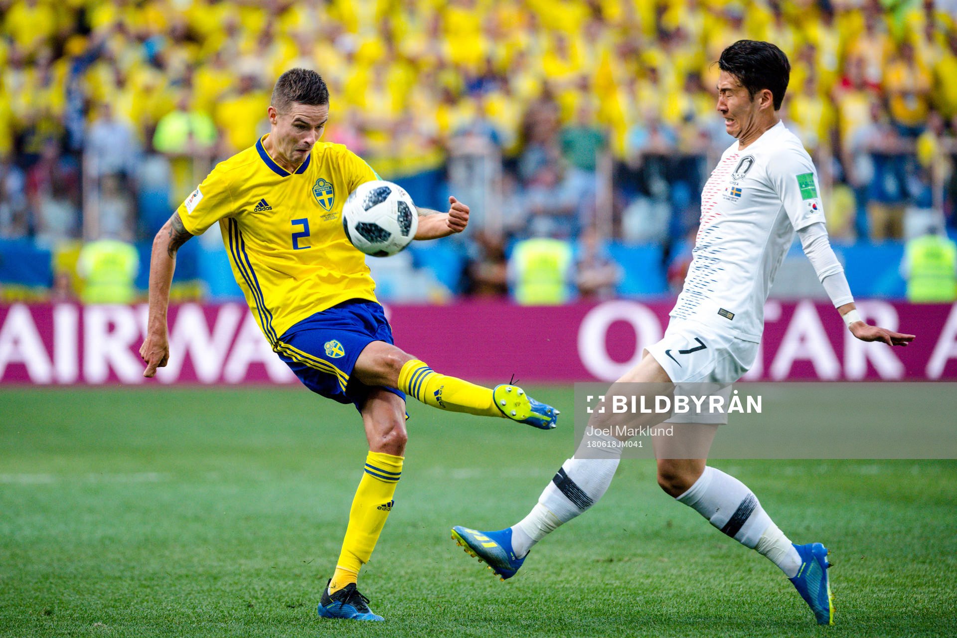 Mikael Lustig of Sweden and Heungmin Son Heungmin Son