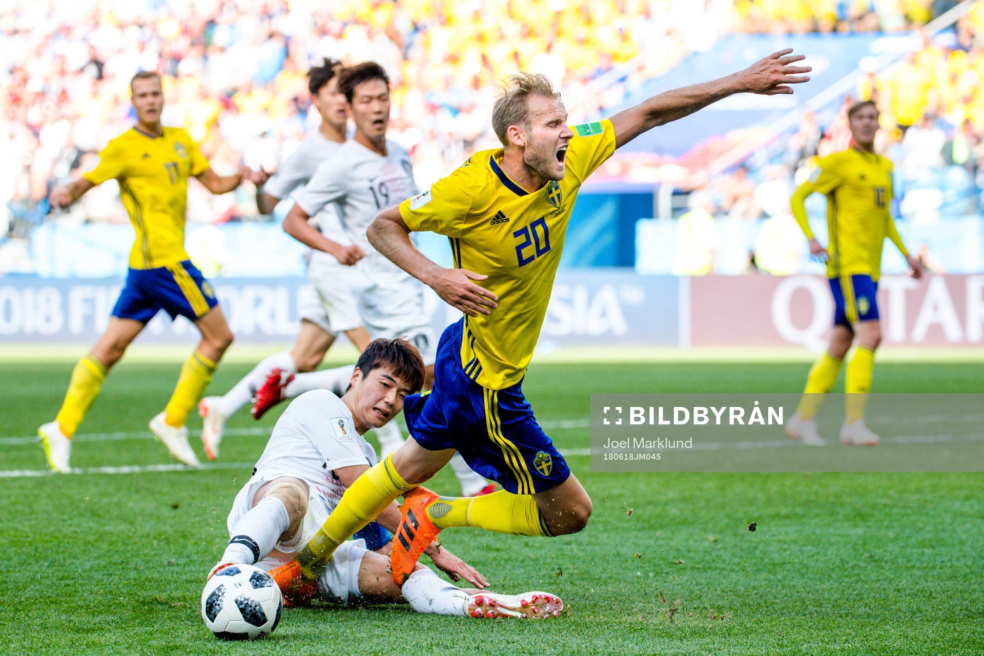 Sungyueng Ki of South Korea against Ola Toivonen of Sweden