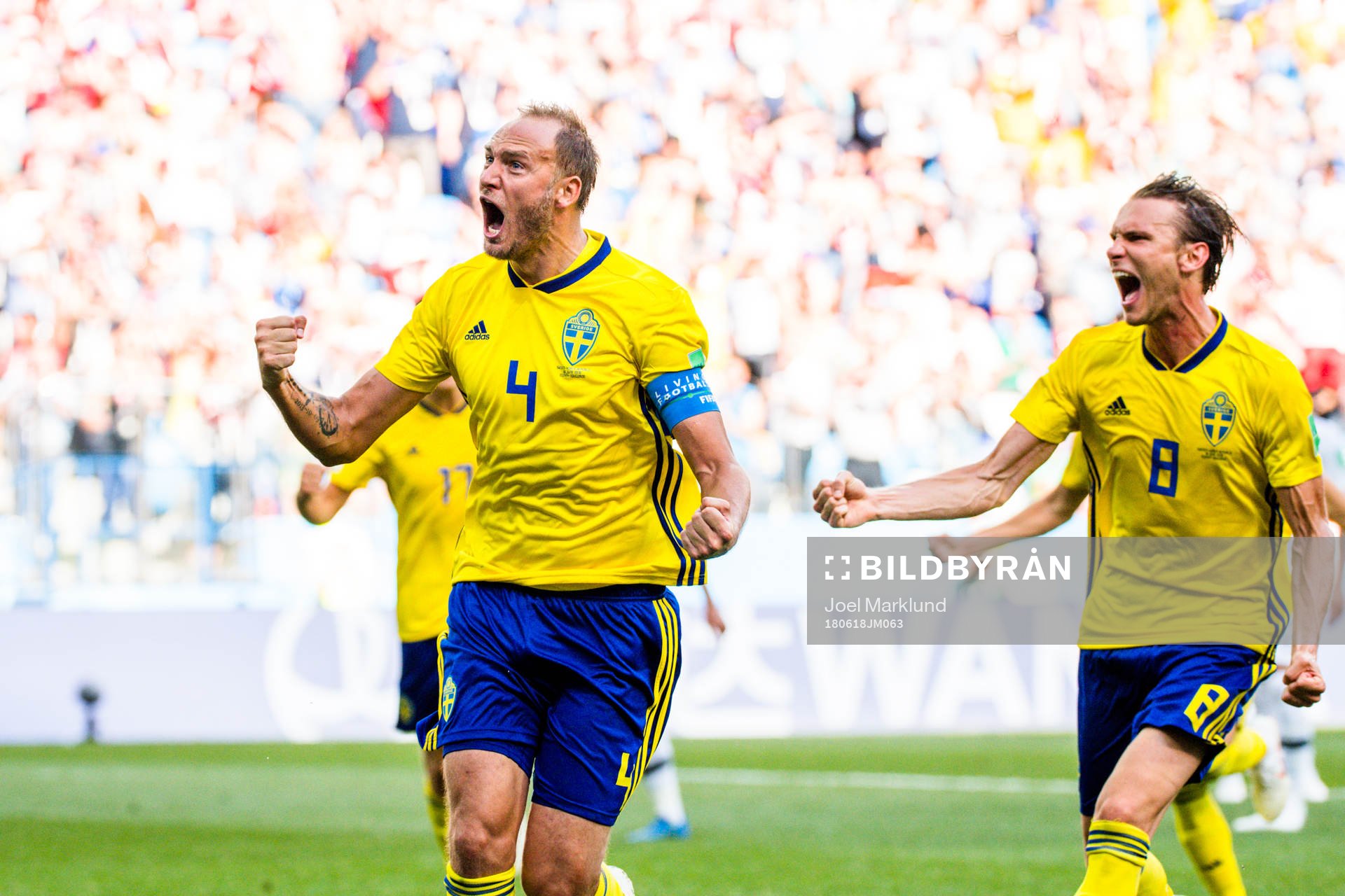 Andreas Granqvist and Albin Ekdal of Sweden celebrates the