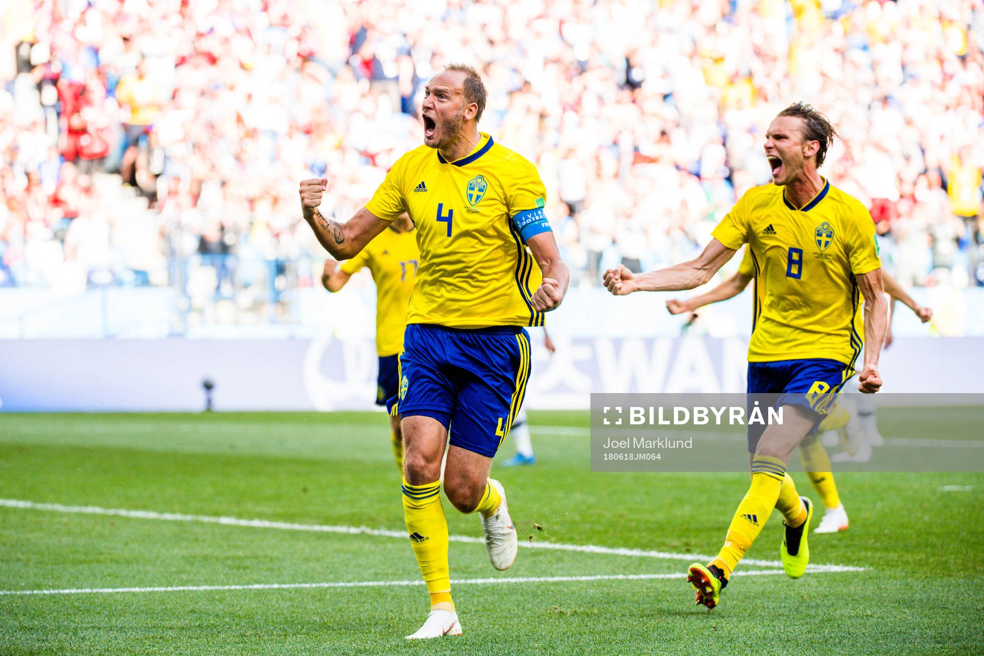 Andreas Granqvist and Albin Ekdal of Sweden celebrates the