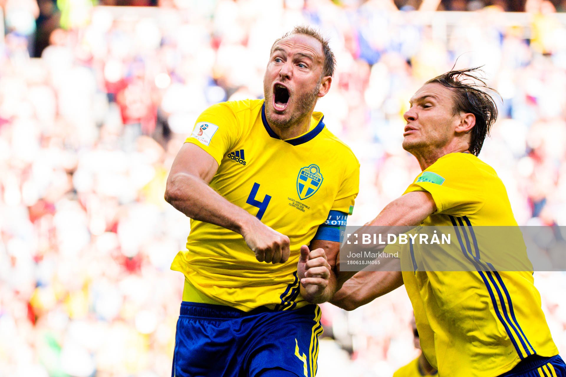 Andreas Granqvist and Albin Ekdal of Sweden celebrates the