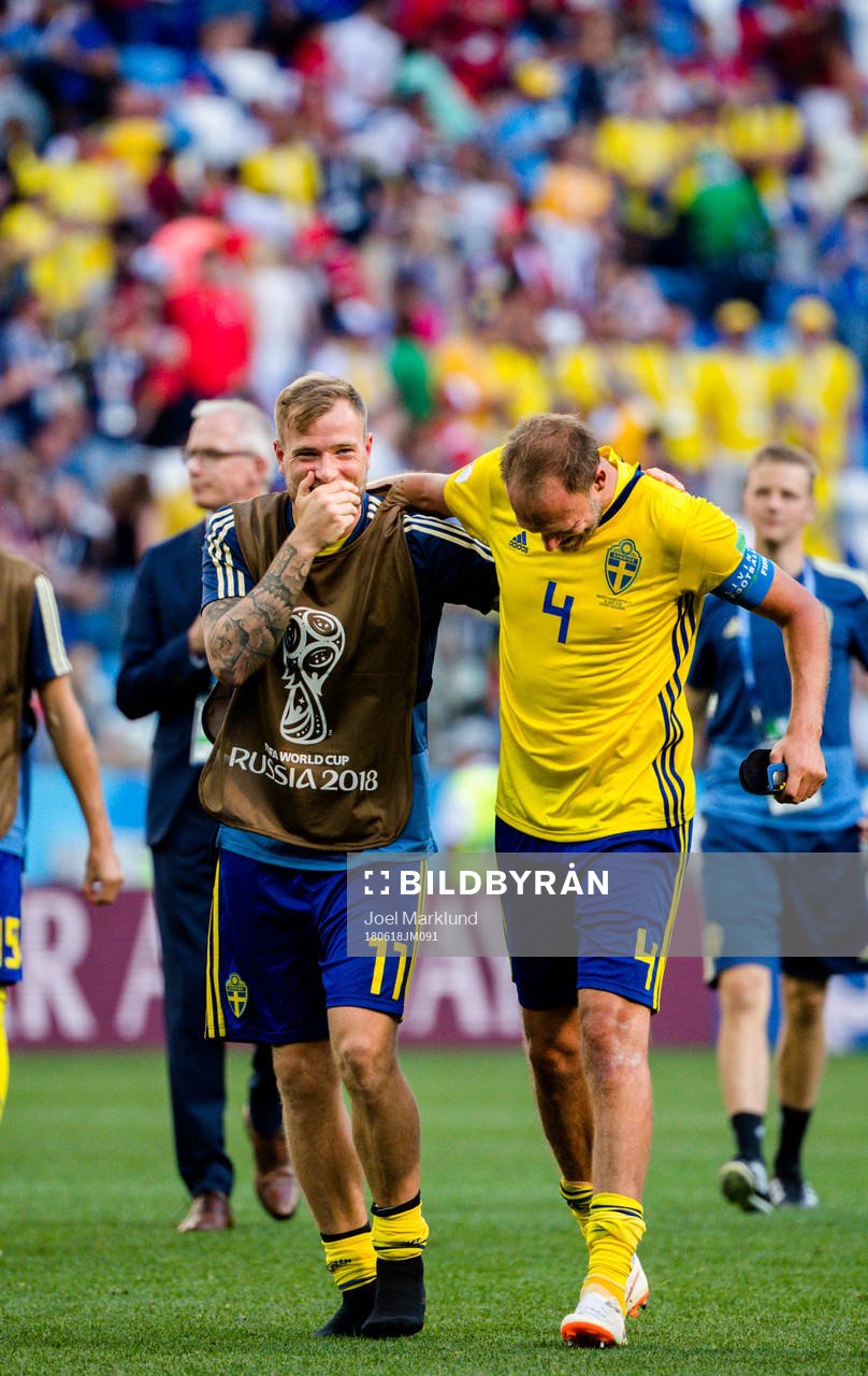 John Guidetti and Andreas Granqvist of Sweden celebrates