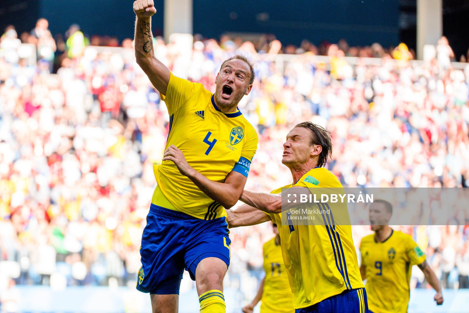 Andreas Granqvist and Albin Ekdal of Sweden celebrates the