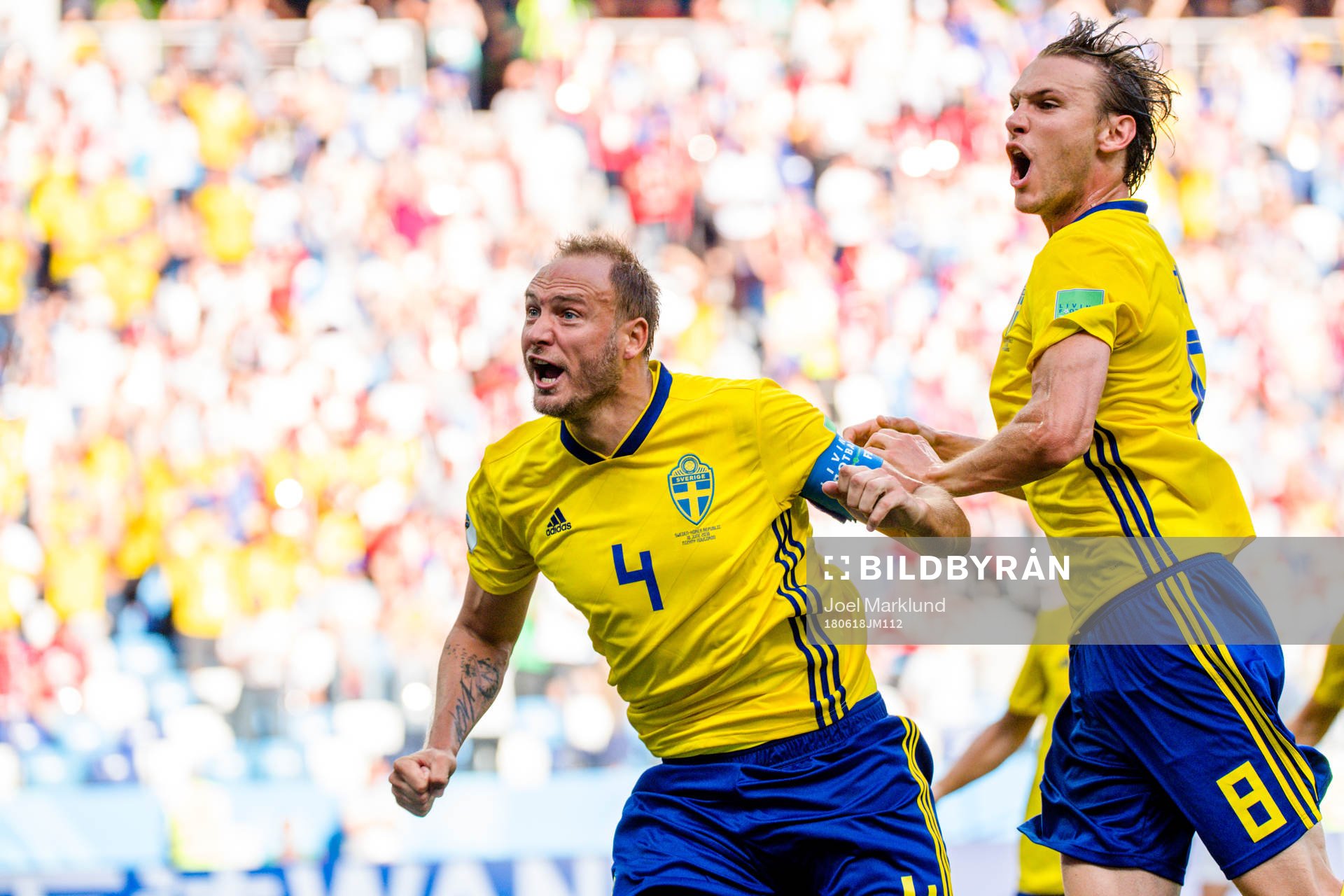 Andreas Granqvist and Albin Ekdal of Sweden celebrates the