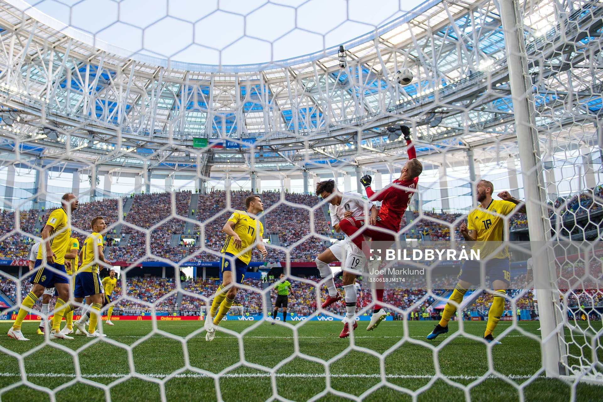 Younggwon Kim of South Korea in action for the ball against