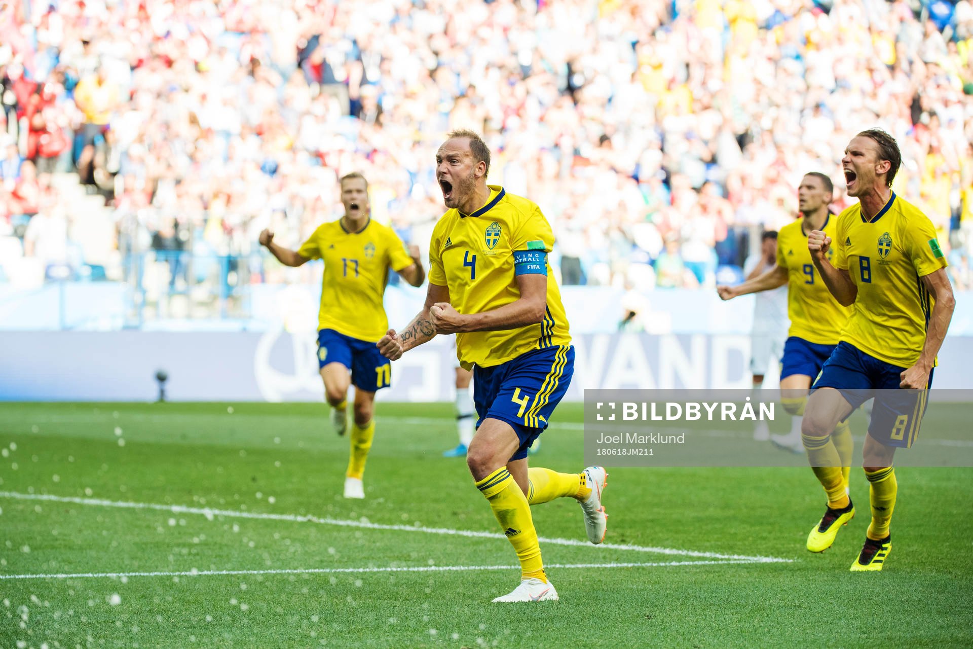 Andreas Granqvist of Sweden celebrates together with