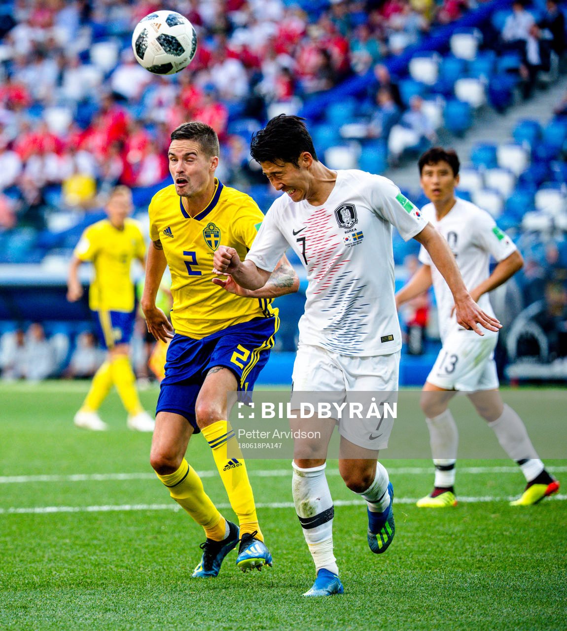 Mikael Lustig of Sweden and Heungmin Son of South Korea