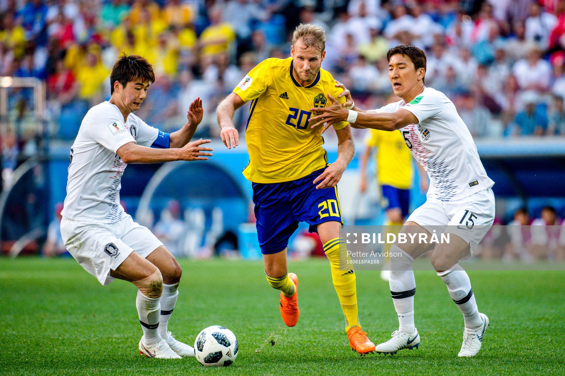 Ola Toivonen of Sweden and Wooyoung Jung of South Korea
