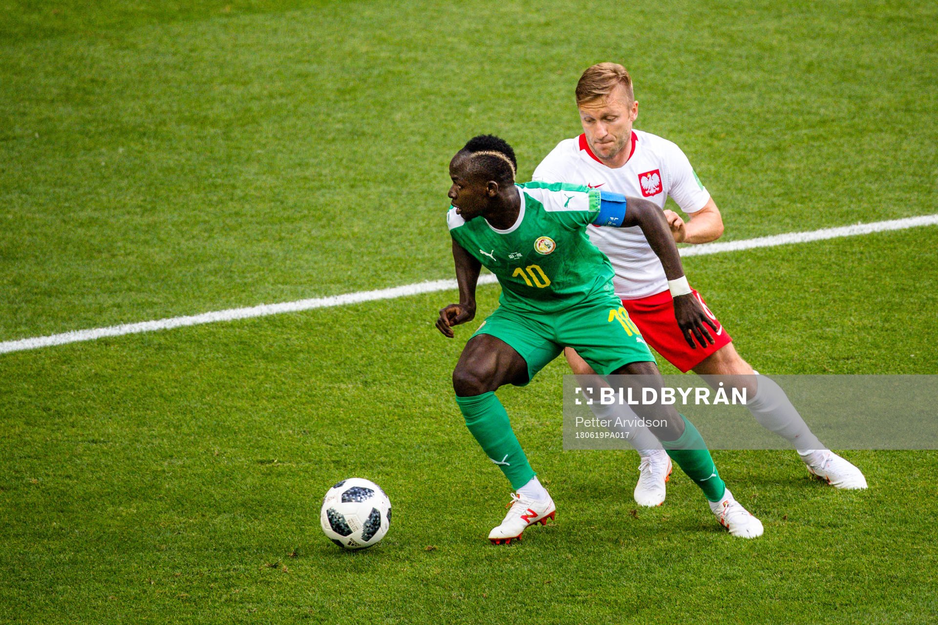 Sadio Mane of Senegal and Jacek Goralski of Poland
