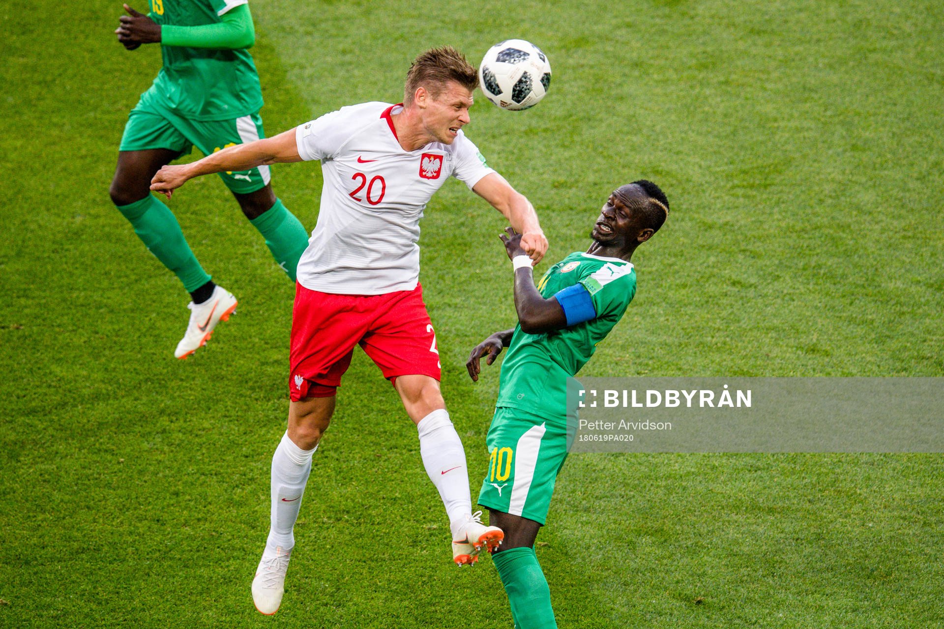 Lukasz Piszczek of Poland and Sadio Mane of Senegal
