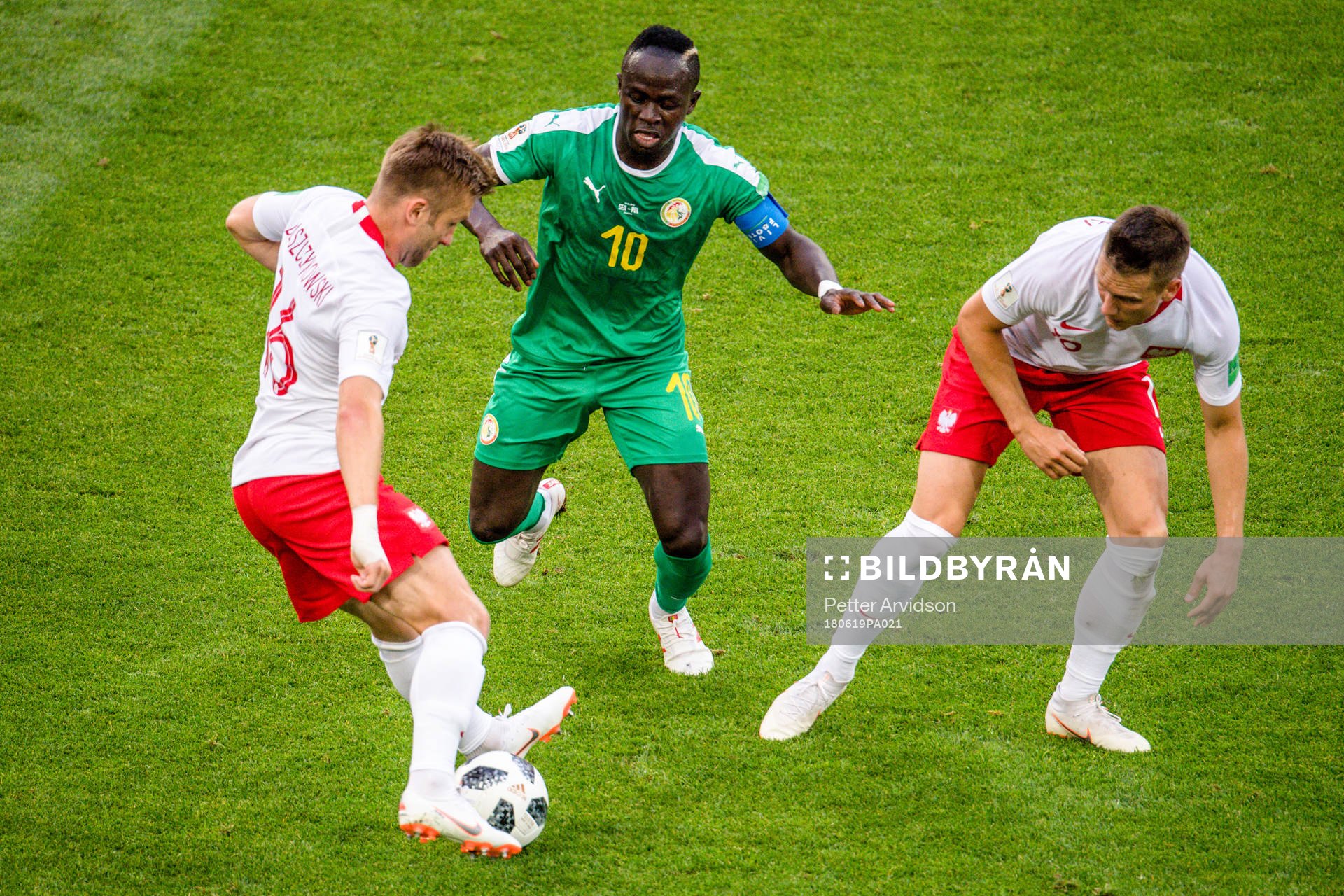 Sadio Mane of Senegal against Jakub Blaszczykowski and