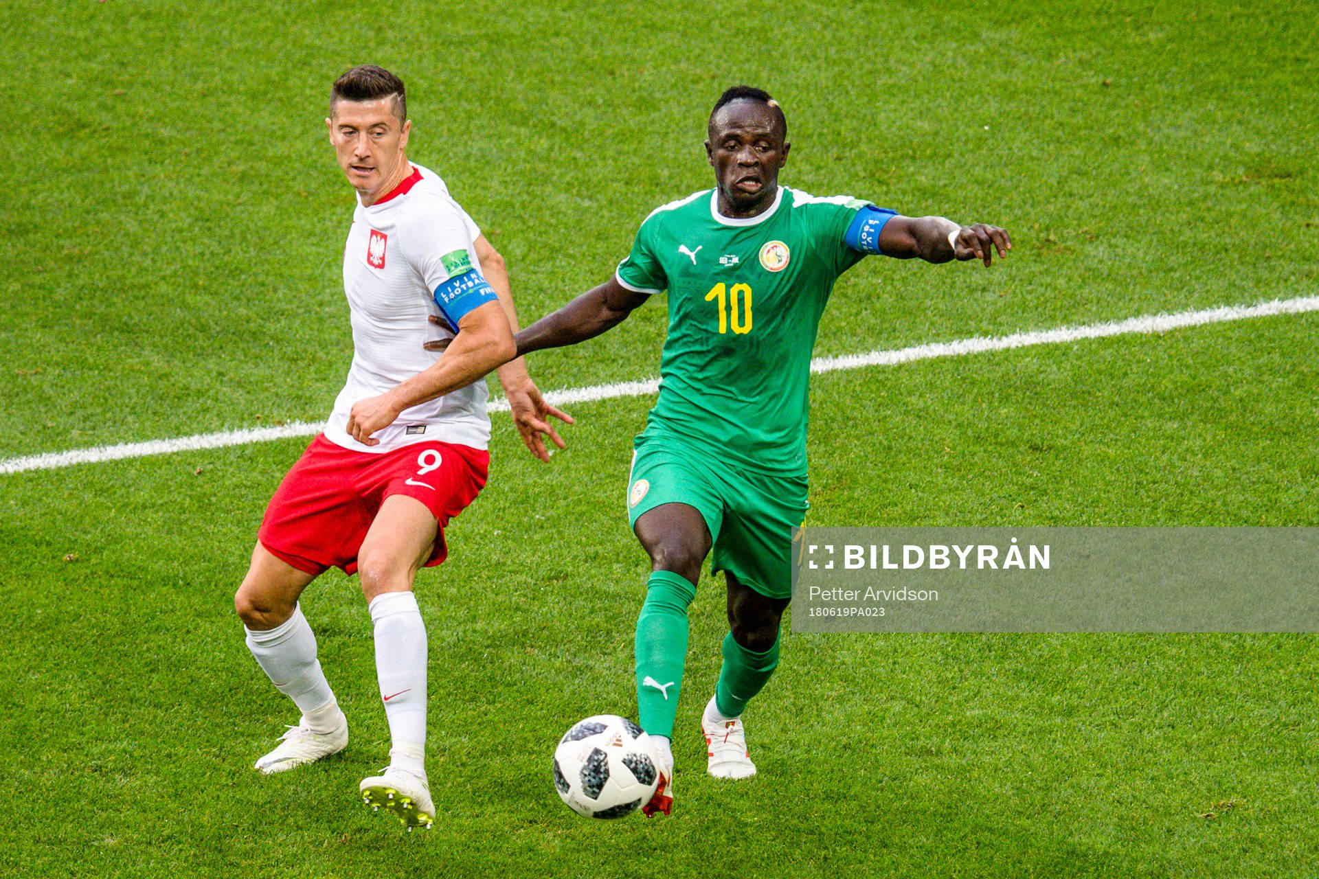 Robert Lewandowski of Poland and Sadio Mane of Senegal