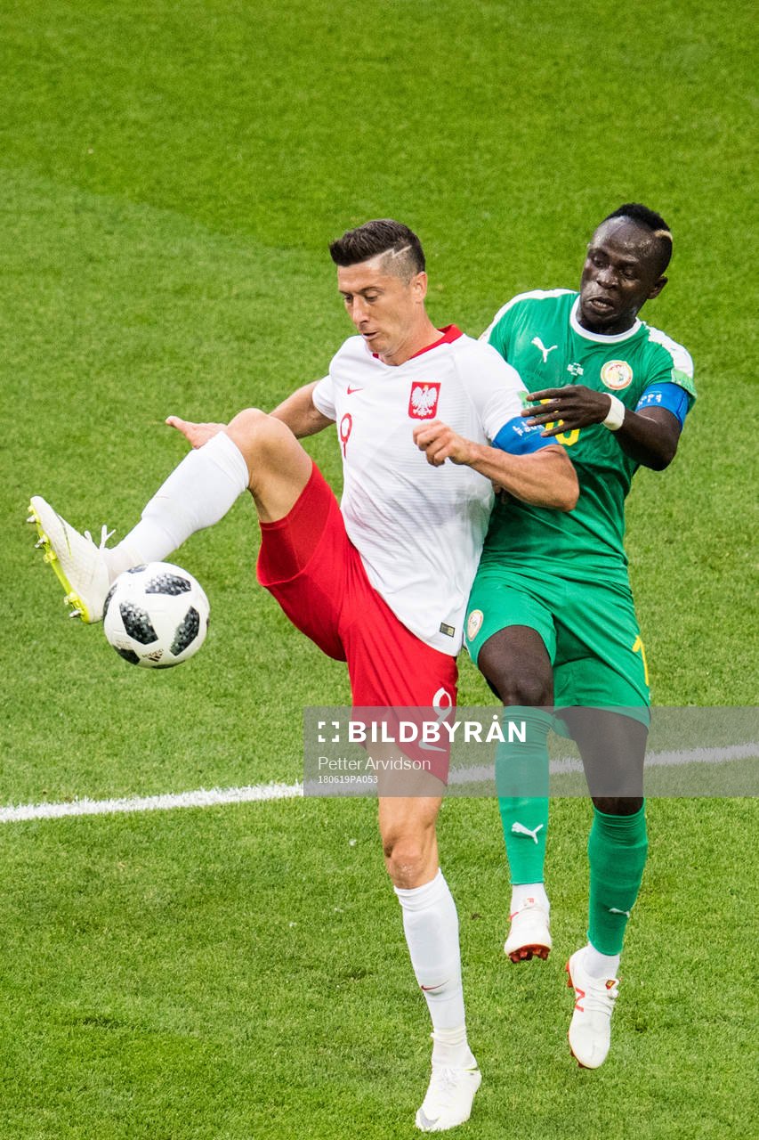 Robert Lewandowski of Poland and Sadio Mane of Senegal