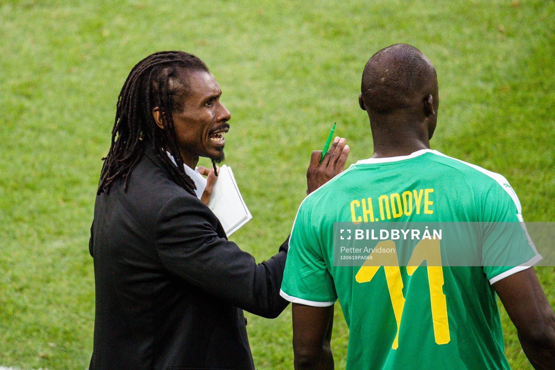 head coach Aliou Cisse and Cheikh Ndoye of Senegal