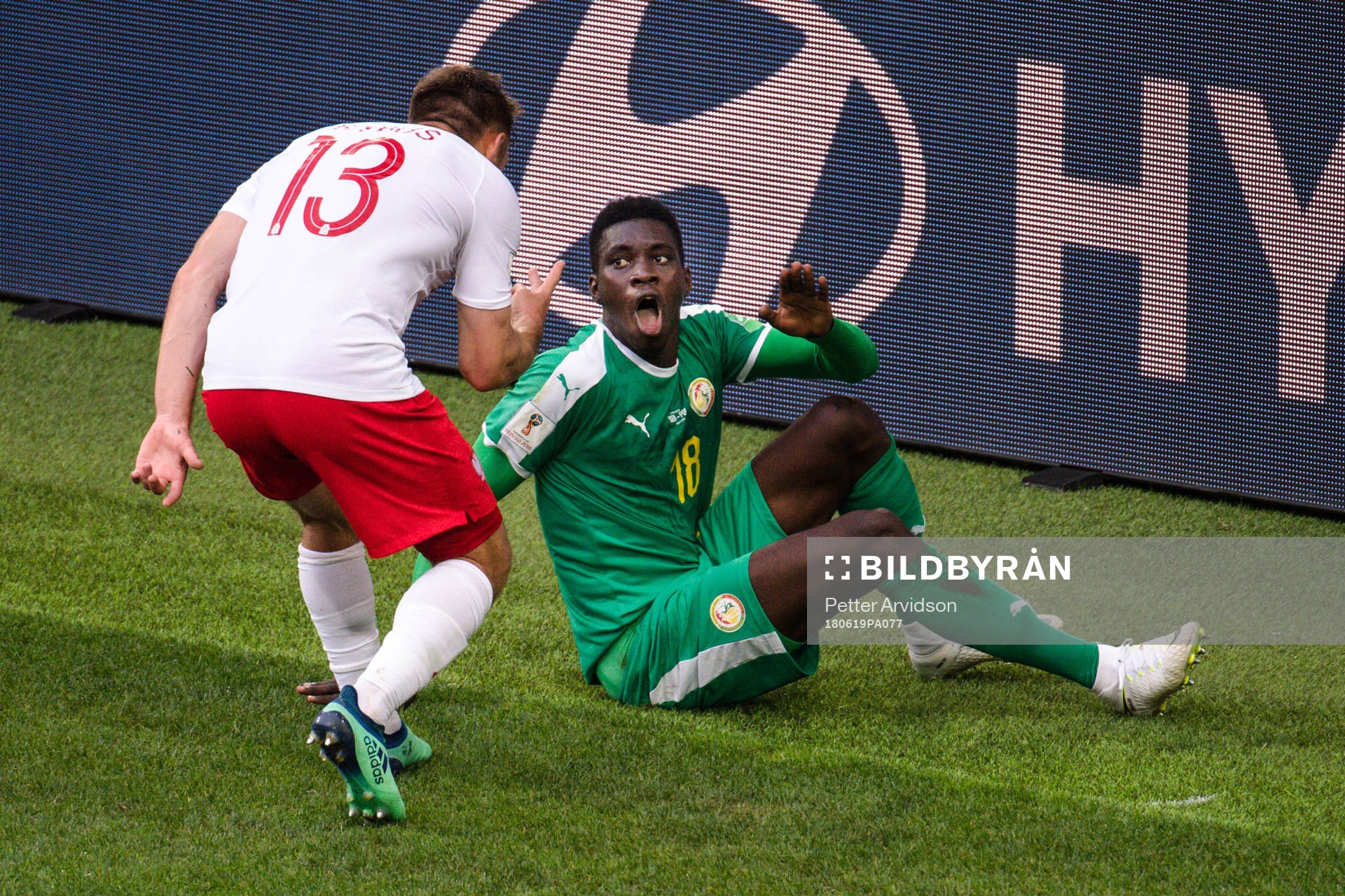Maciej Rybus of Poland and Ismaila Sarr of Senegal