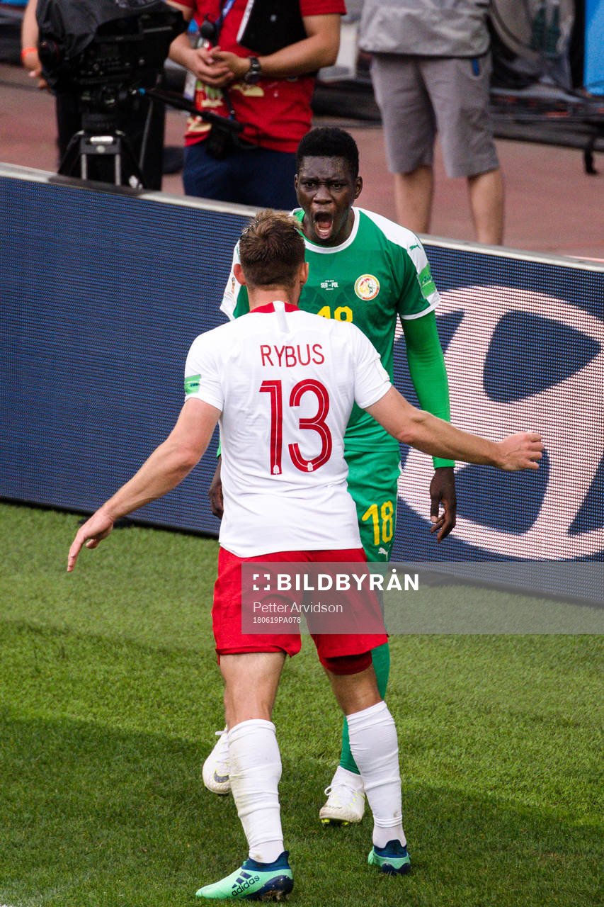 Maciej Rybus of Poland and Ismaila Sarr of Senegal