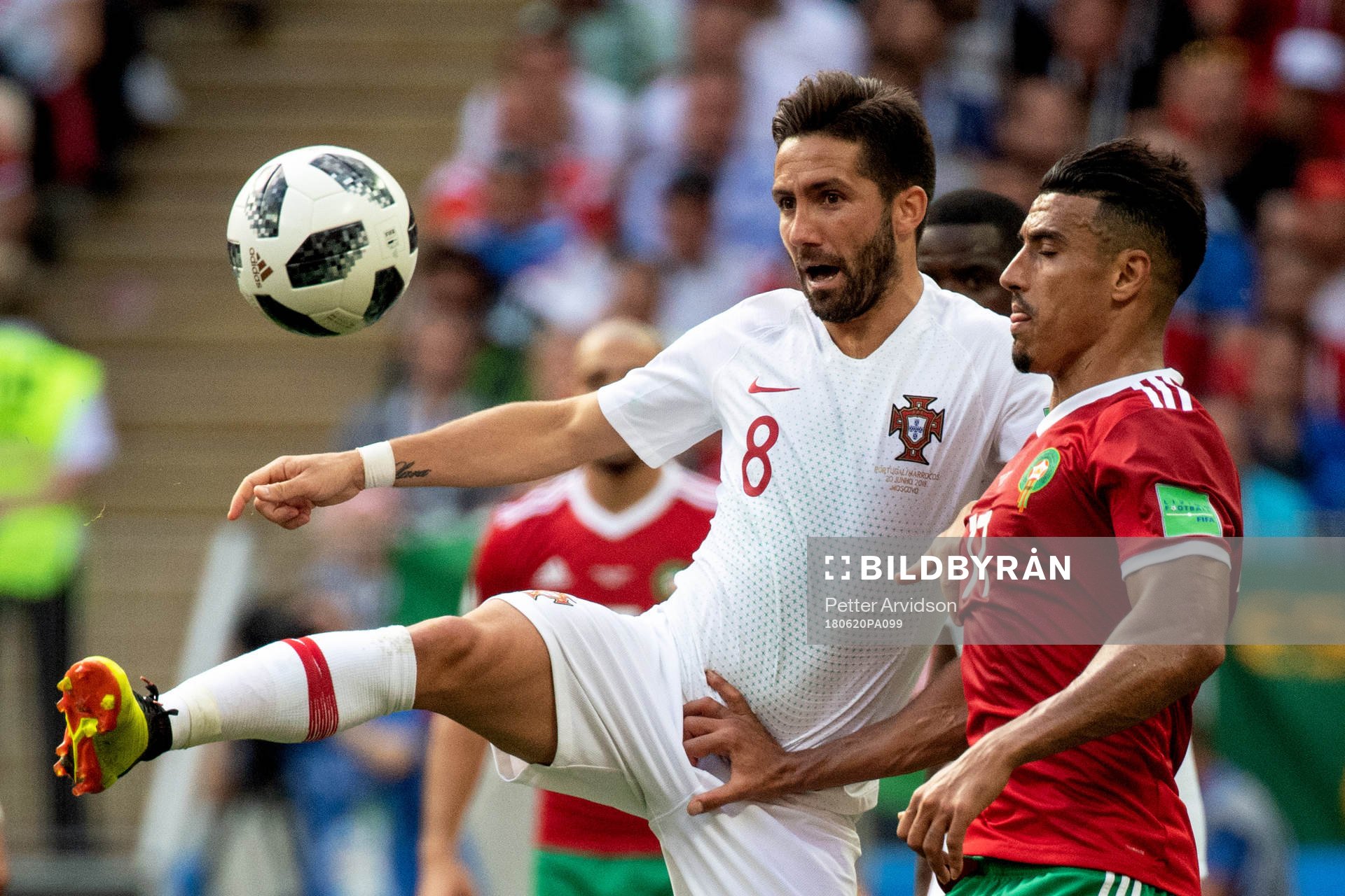 Joao Moutinho of Portugal and Nabil Dirar of Morocco during the FIFA World Cup group stage match between Portugal and Morocco on June 20, 2018 in Moscow.