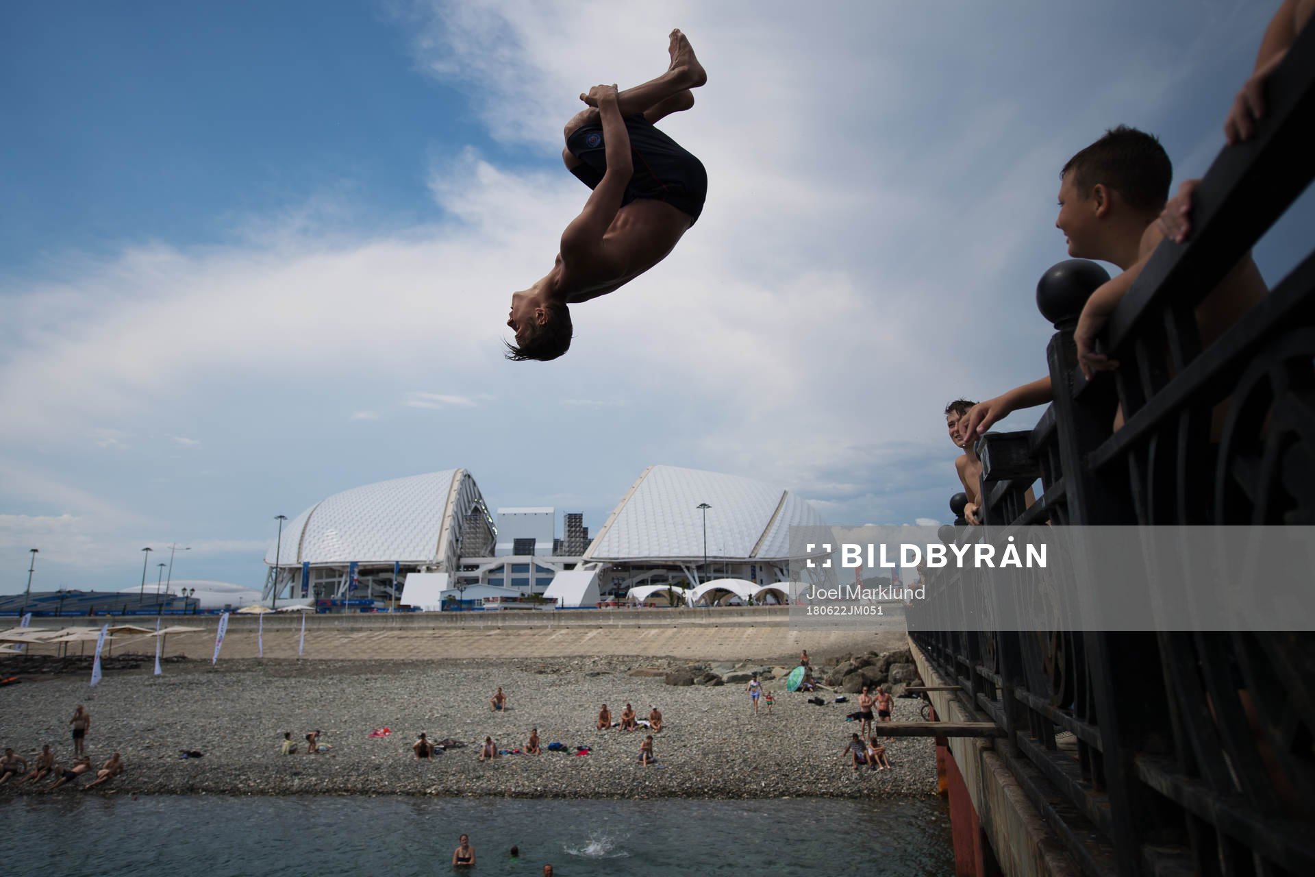 Kids jumping into the water