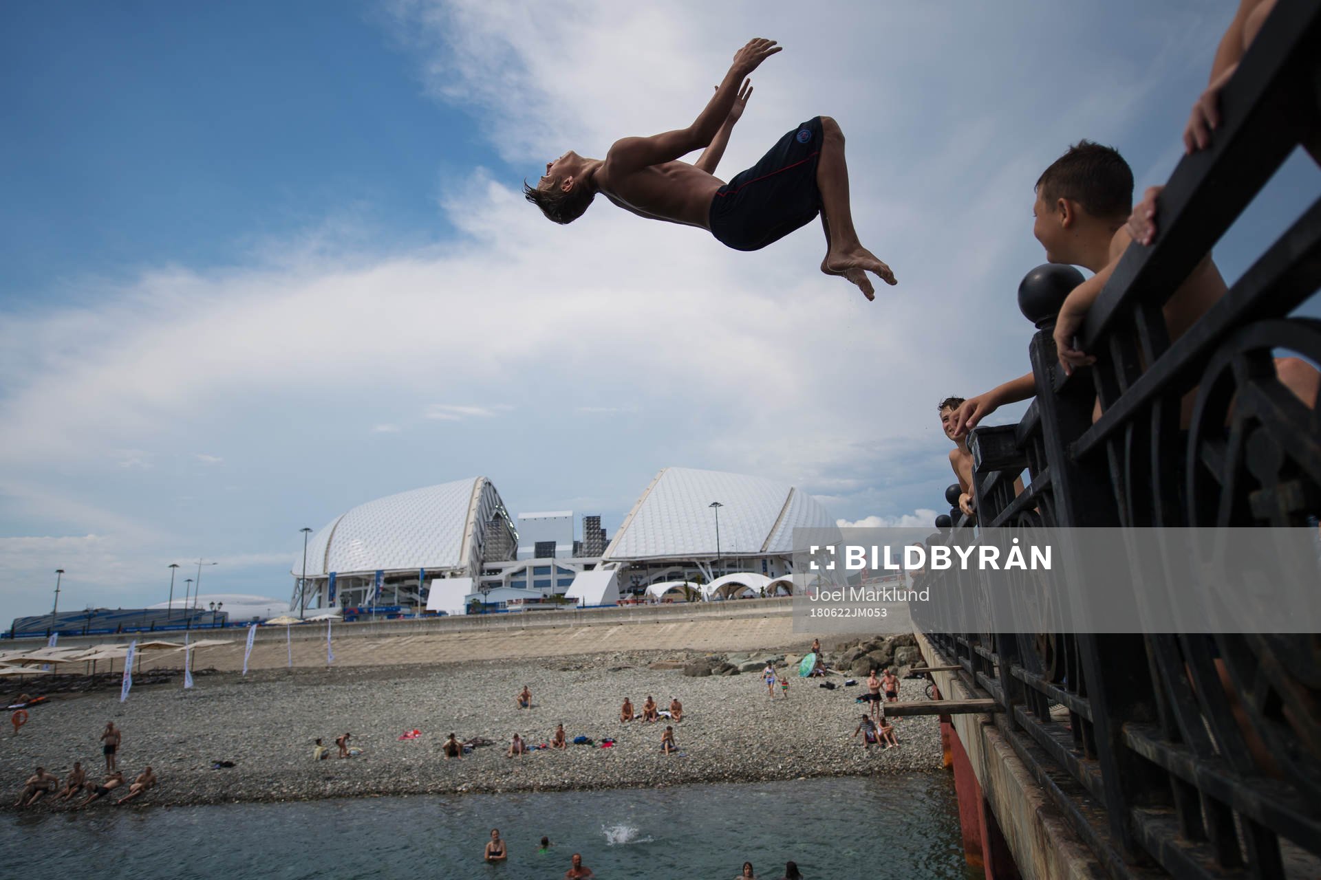 Kids jumping into the water