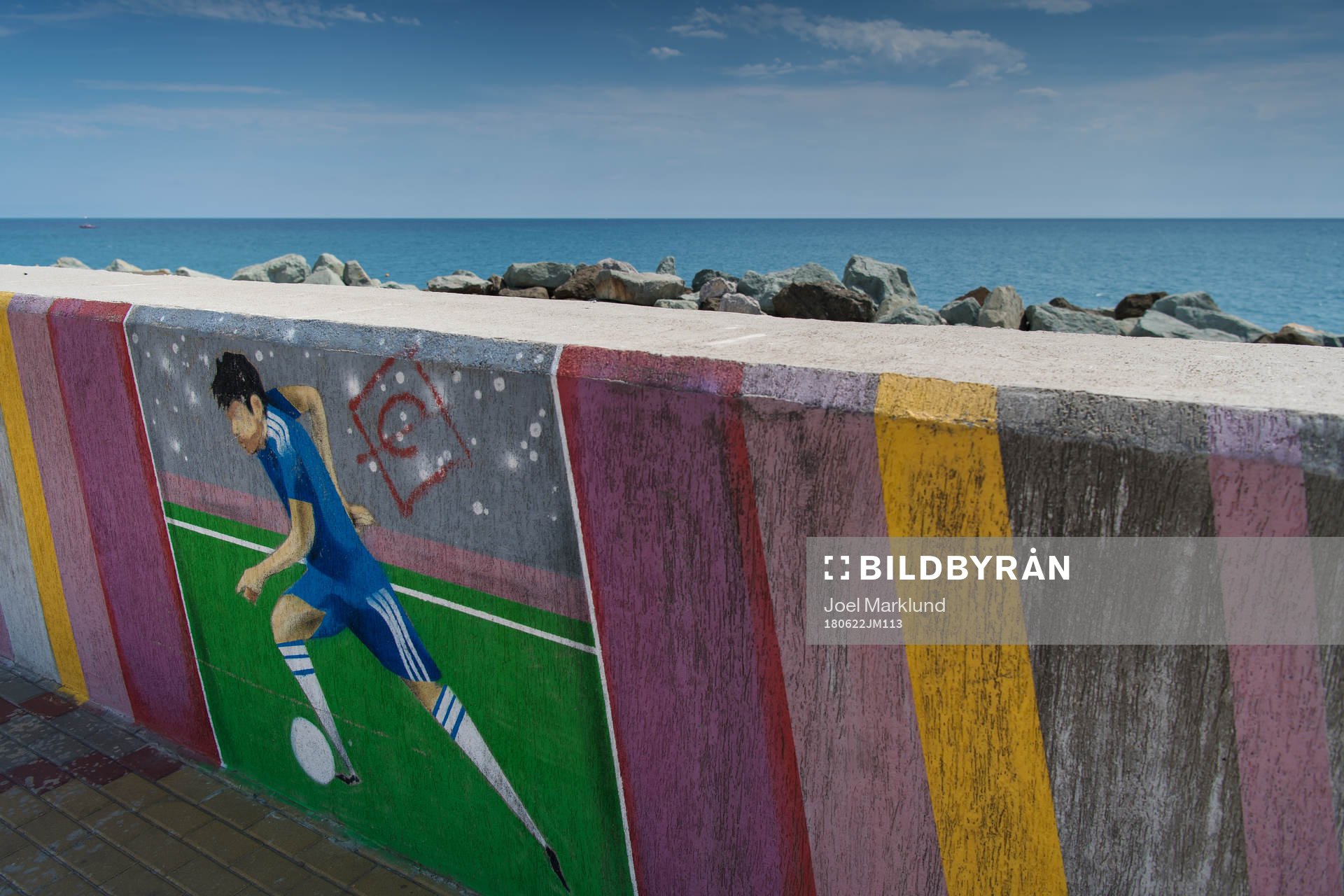 A mural with a football player