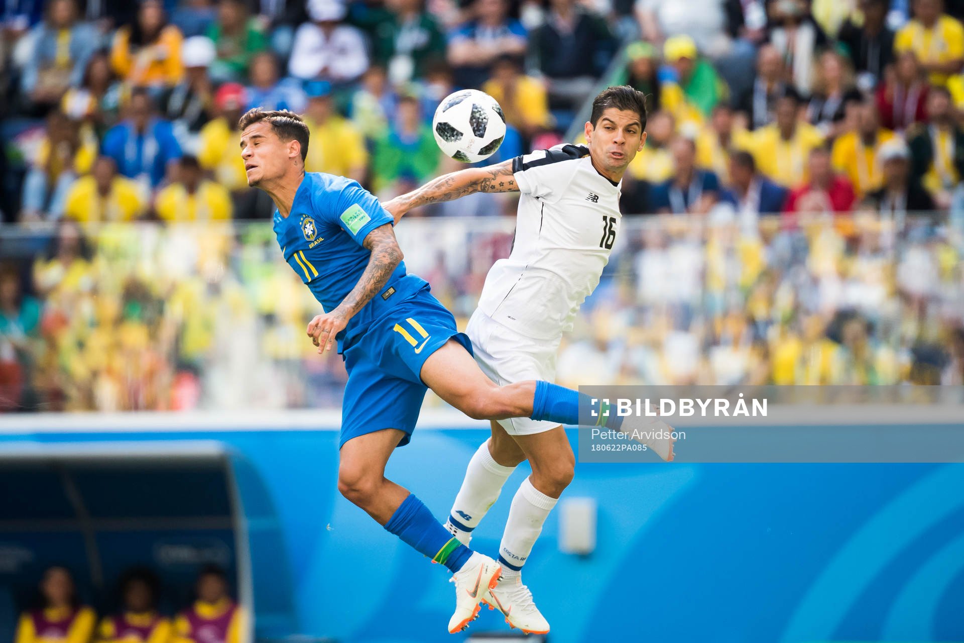 Philippe Coutinho of Brazil and Cristian Gamboa of Costa