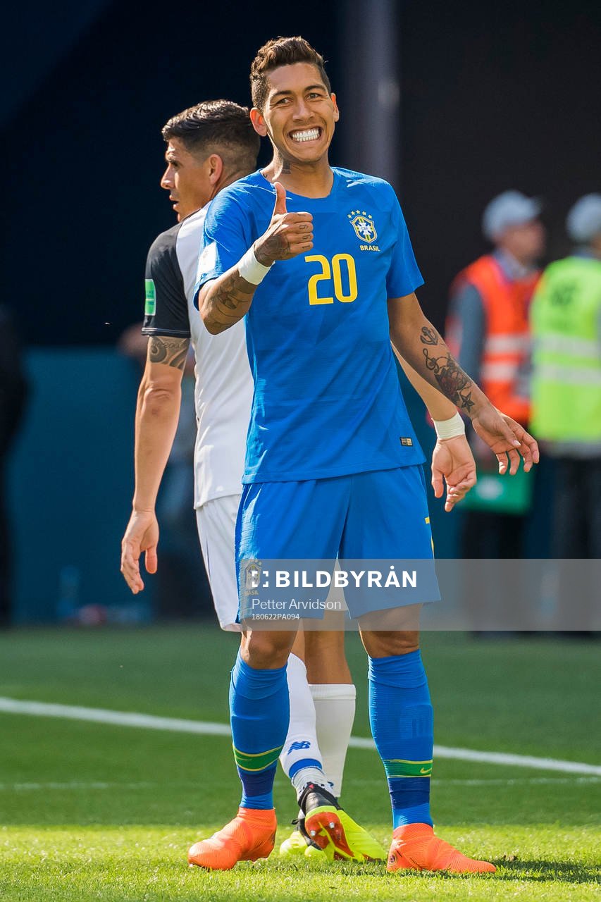 Roberto Firmino of Brazil reacts