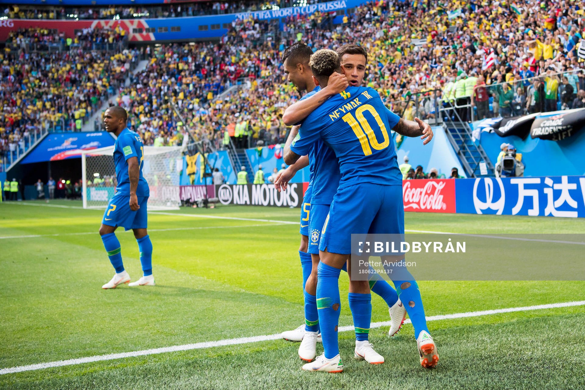Neymar of Brazil celebrates with his teammates