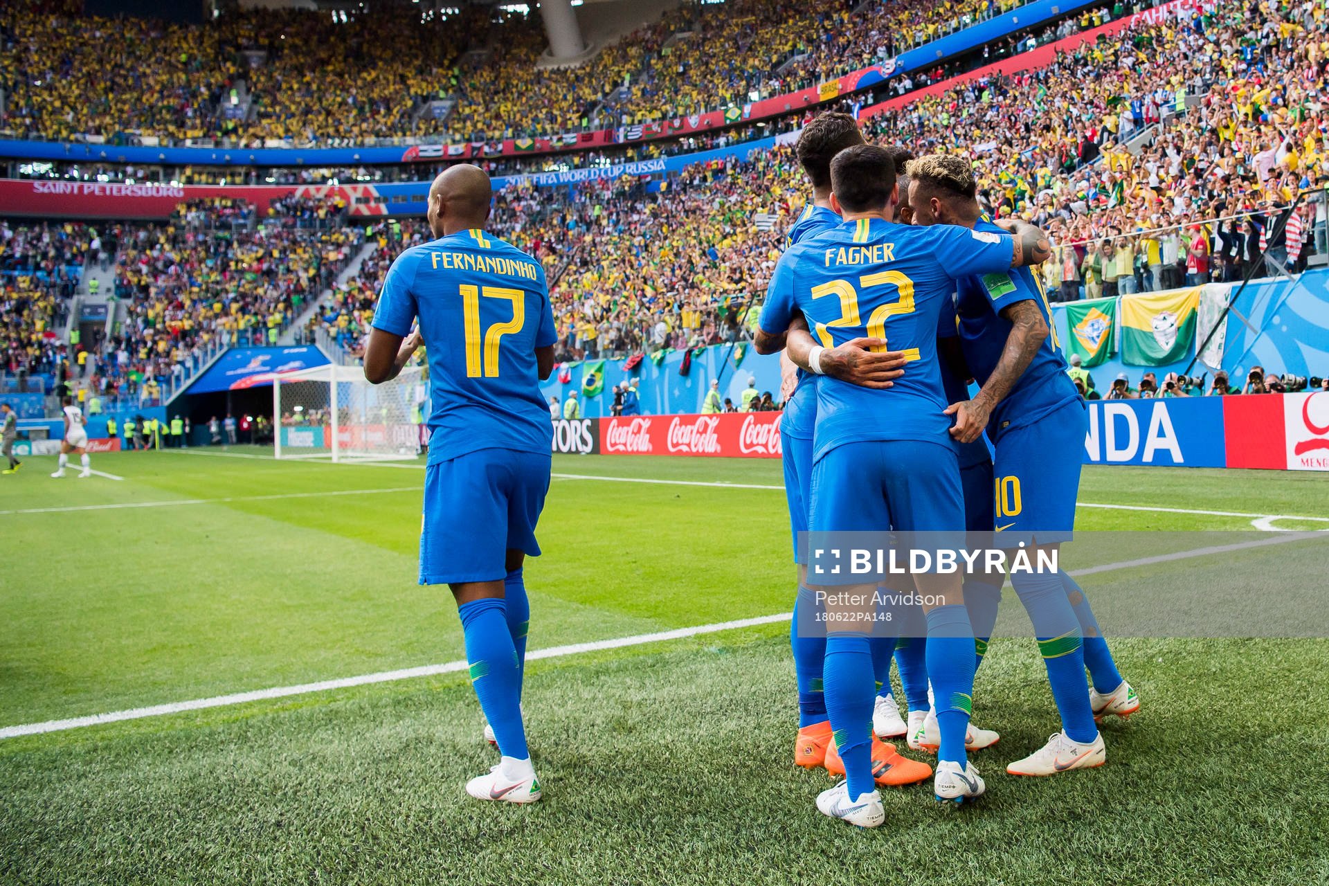 Neymar of Brazil celebrates with his teammates