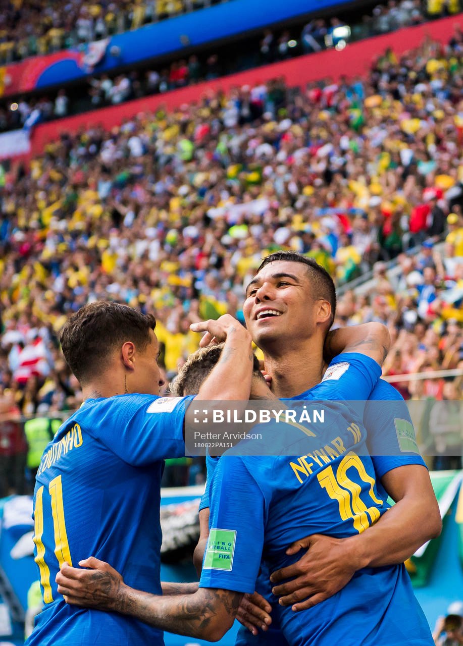 Neymar of Brazil celebrates with his teammates
