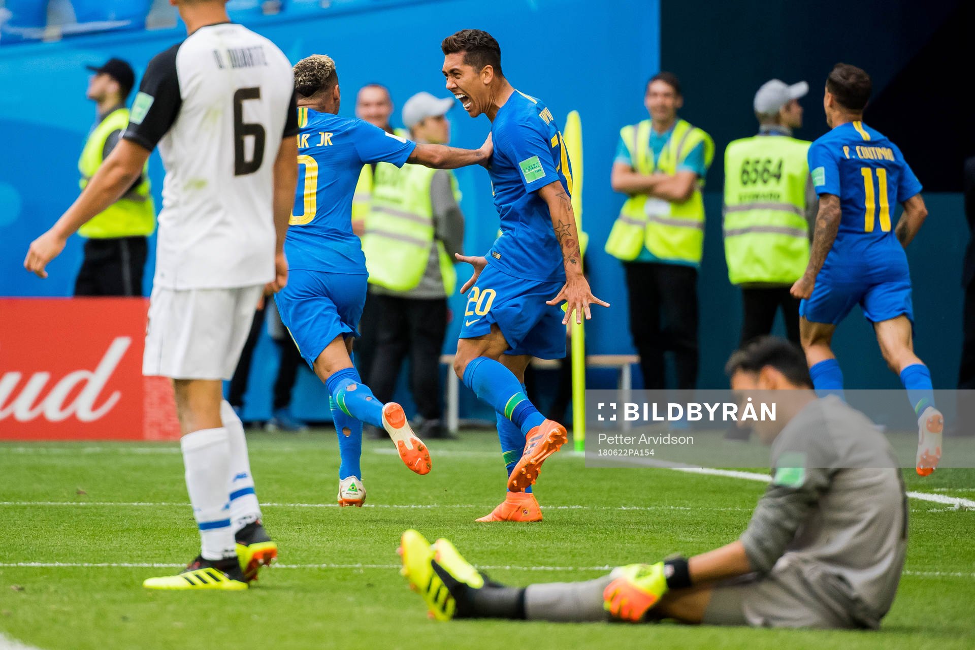 Neymar and Roberto Firmino of Brazil celebrates the 1-0
