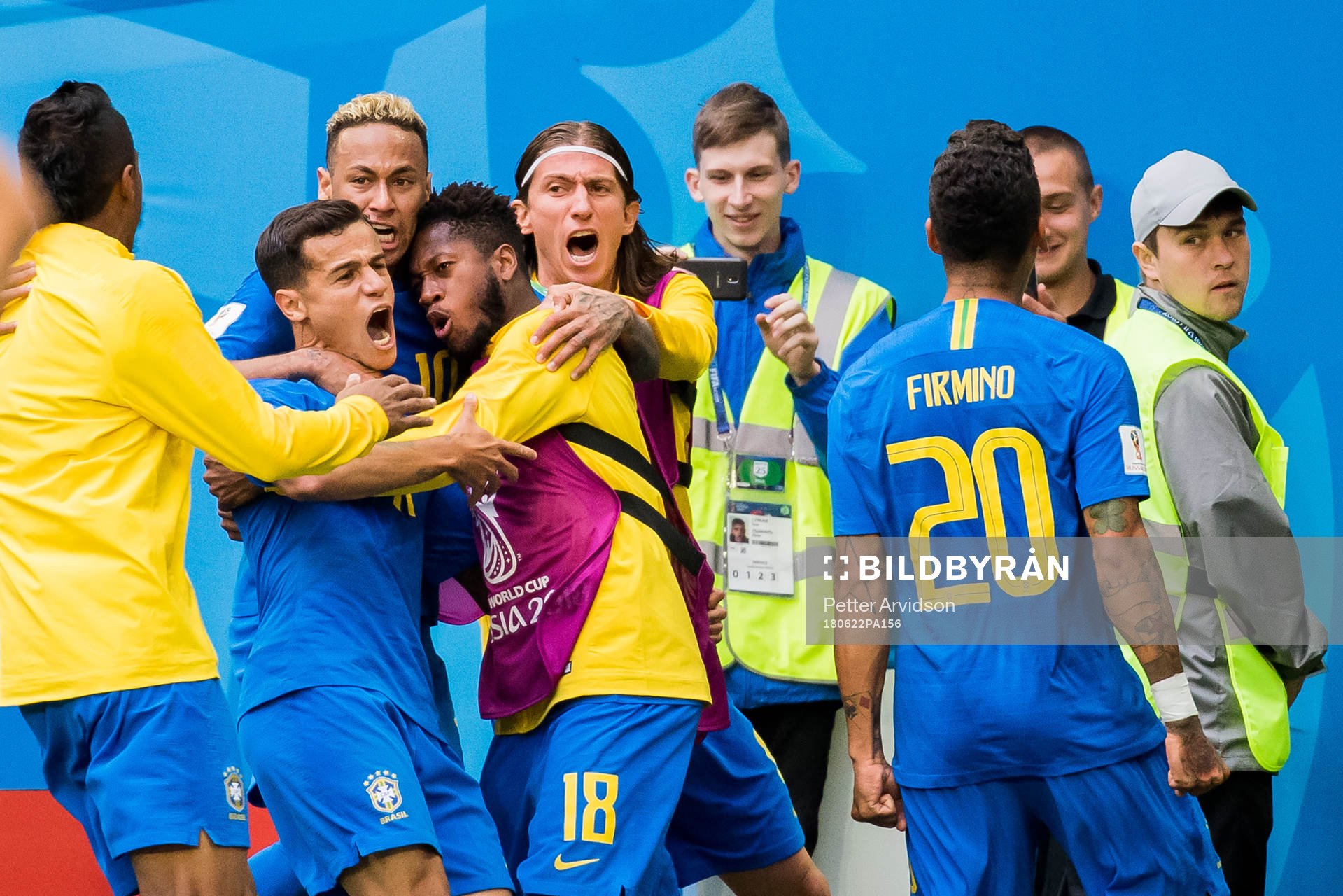 Philippe Coutinho of Brazil celebrates with his teammates