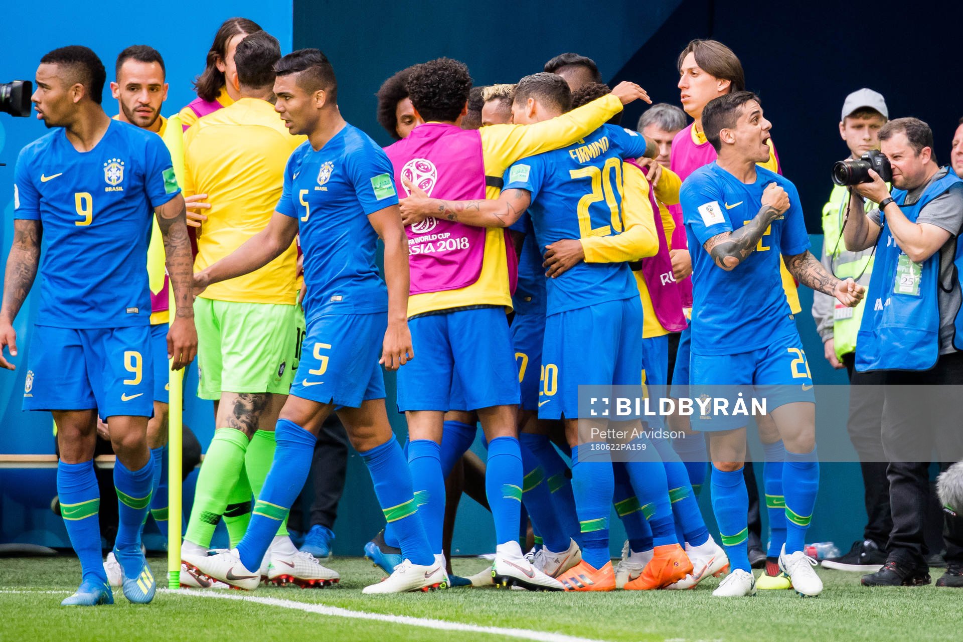 Philippe Coutinho of Brazil celebrates with his teammates