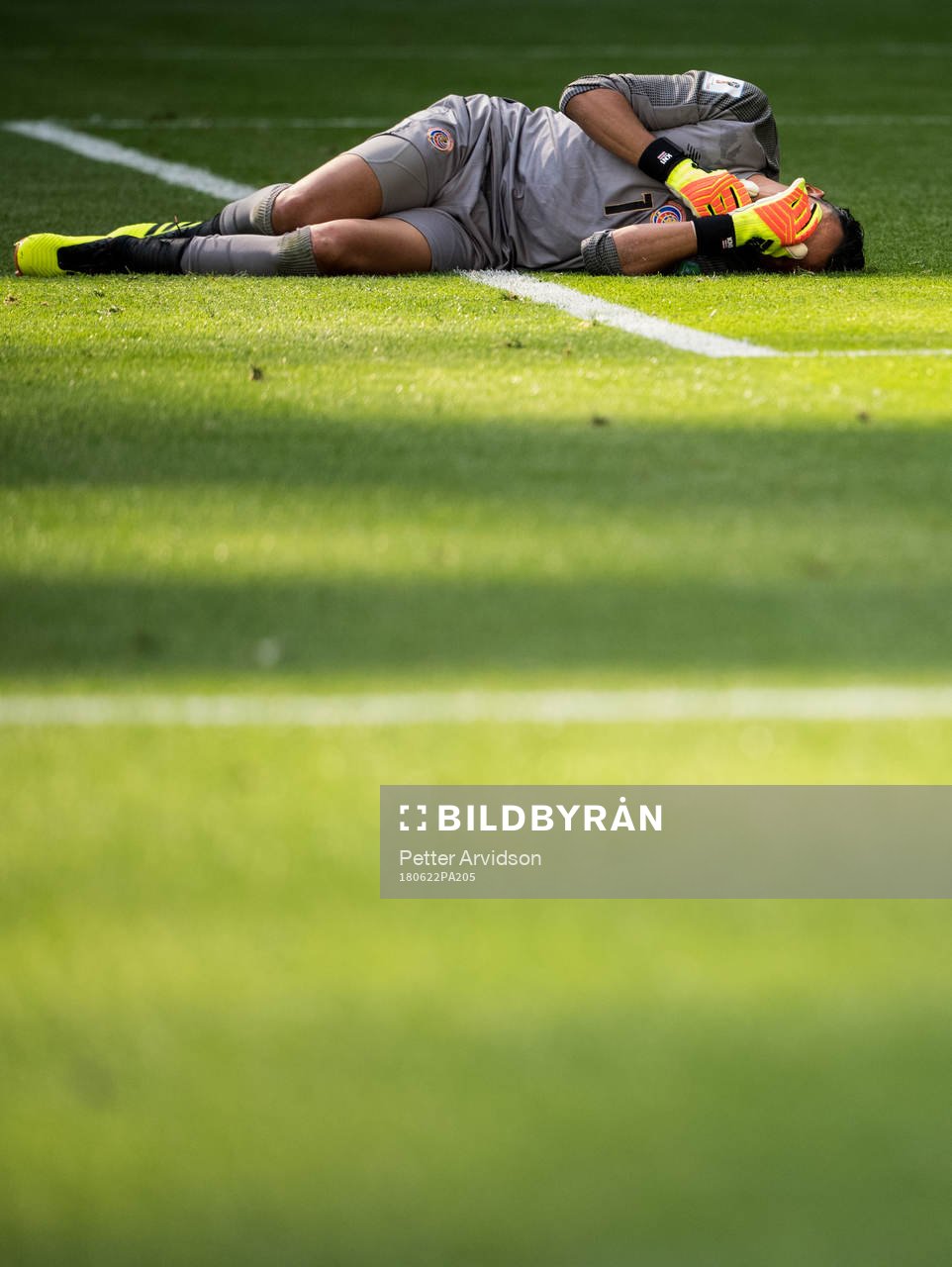 Goalkeeper Keylor Navas of Costa Rica in pain