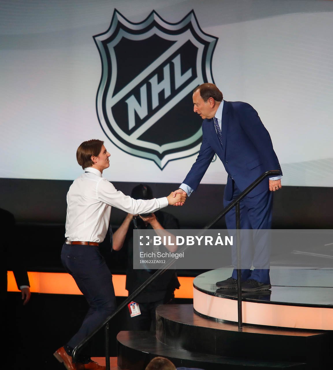 Isac Lundestrom of Sweden is greeted by NHL Commissioner