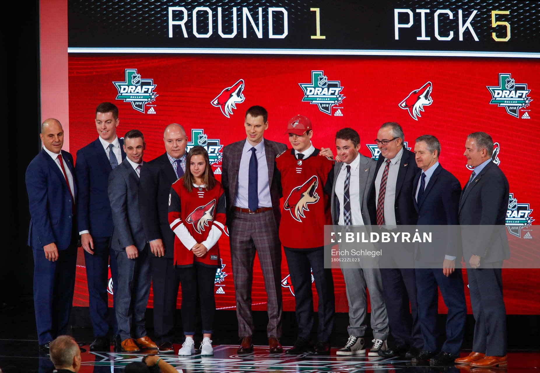 Barrett Hayton of Canada poses with team representatives