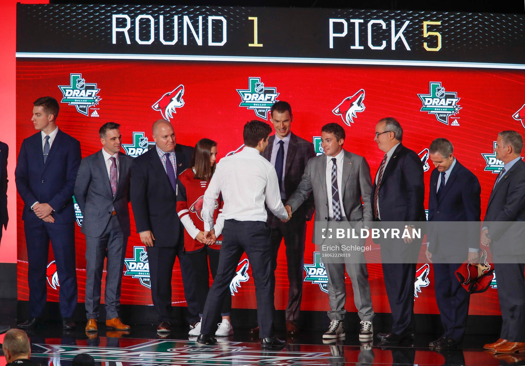 Barrett Hayton of Canada shakes hands with team