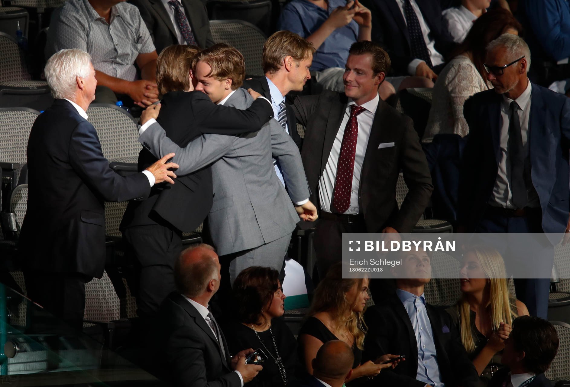 Filip Johansson of Sweden hugs family members