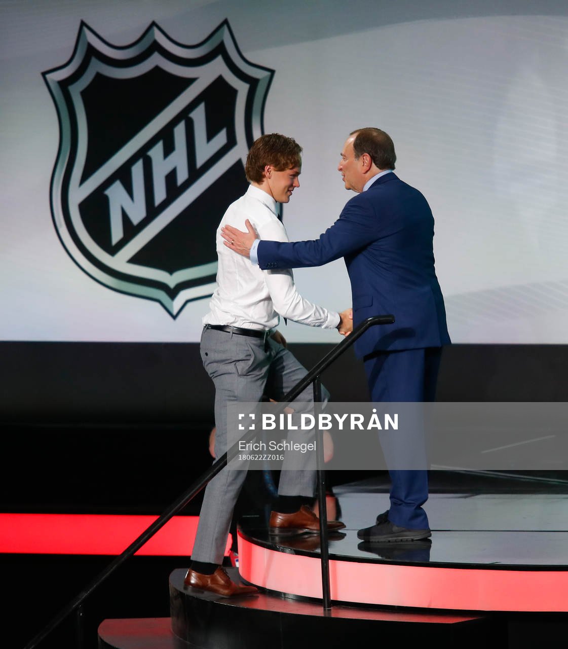 Filip Johansson of Sweden is greeted by NHL Commissioner