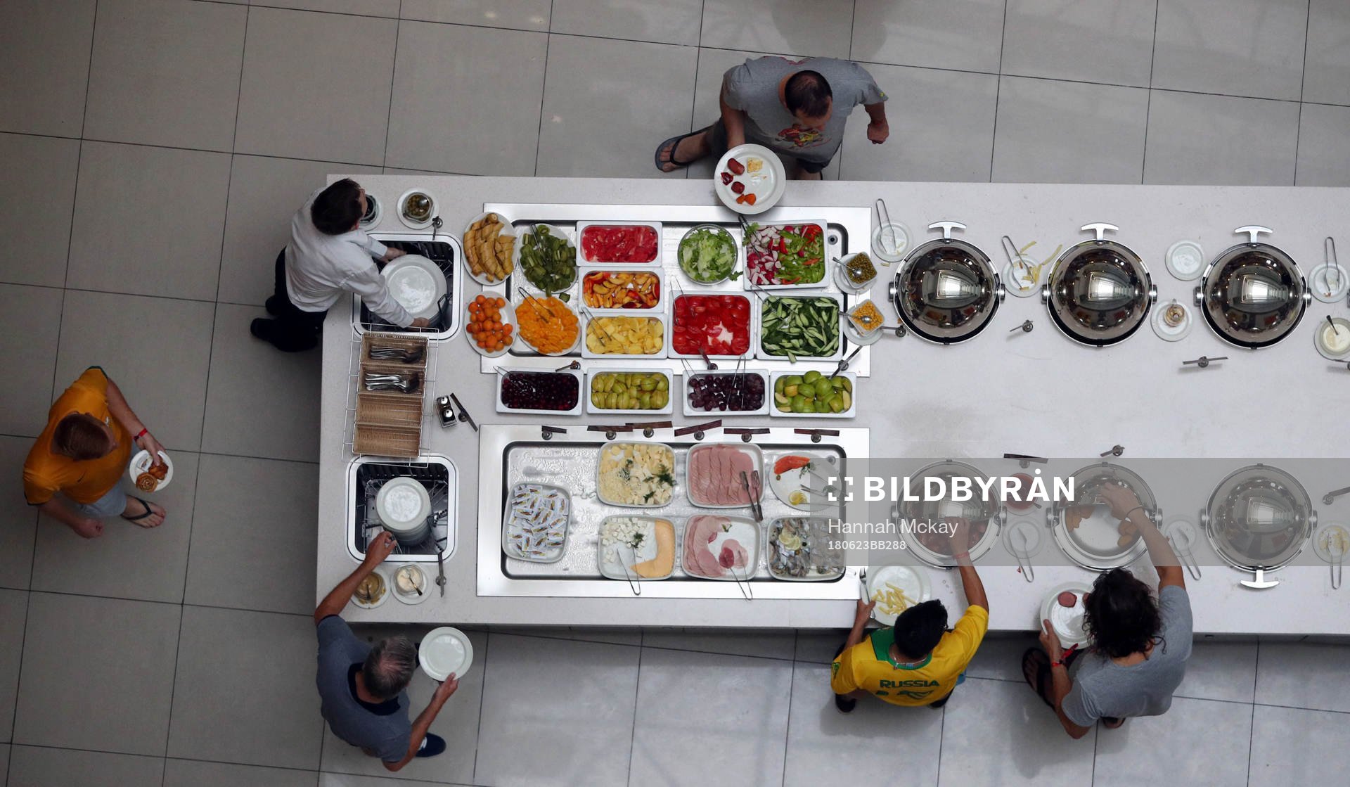 Fotboll, VM Hotel guests serve themselves breakfast at a