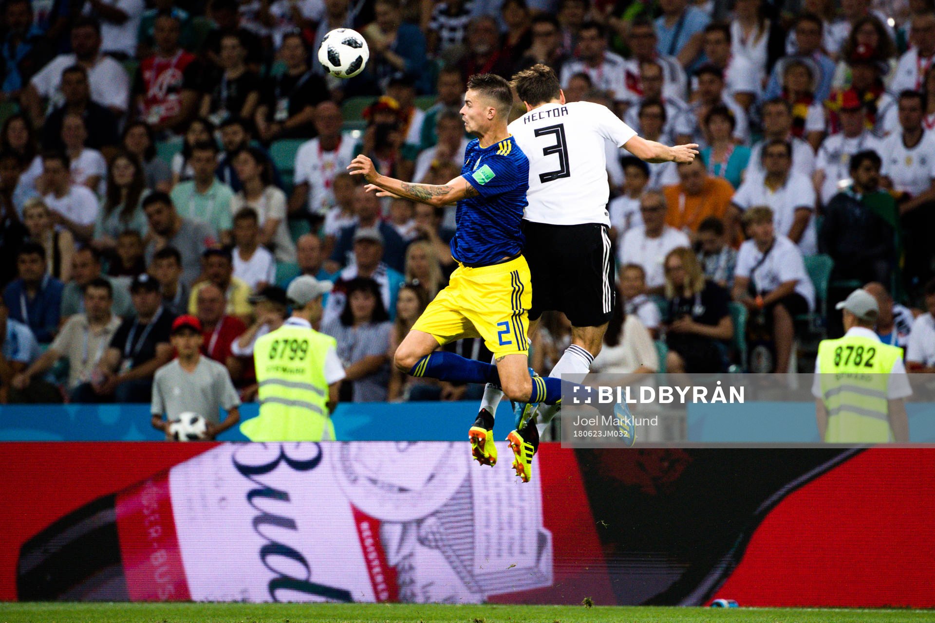 Mikael Lustig of Sweden and Jonas Hector of Germany