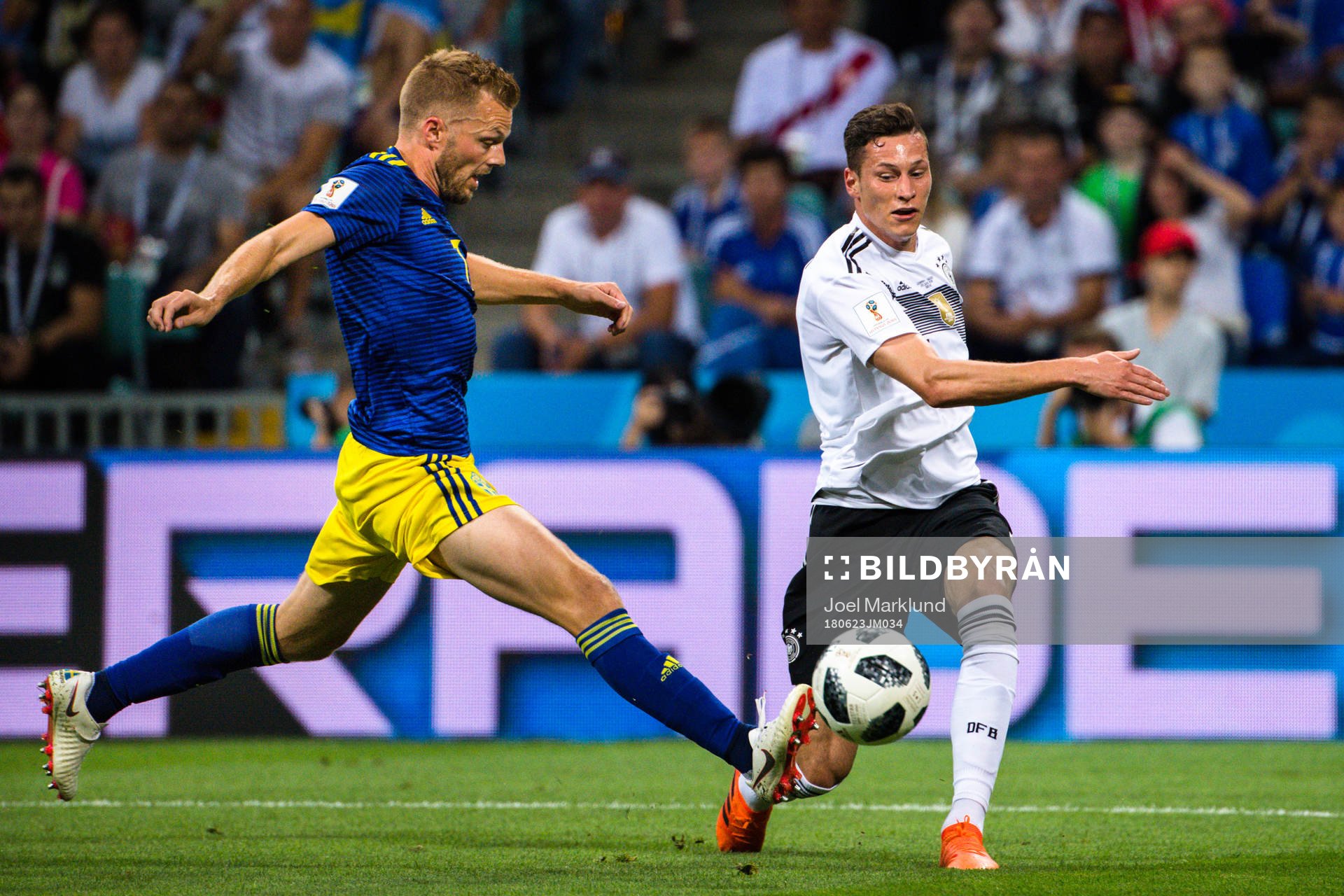 Sebastian Larsson of Sweden and Julian Draxler  of Germany