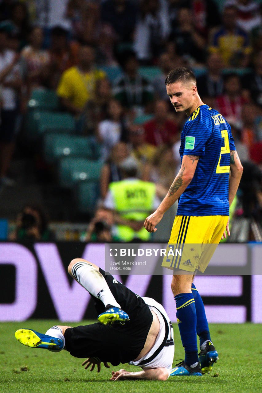 Timo Werner of Germany and Mikael Lustig of Sweden