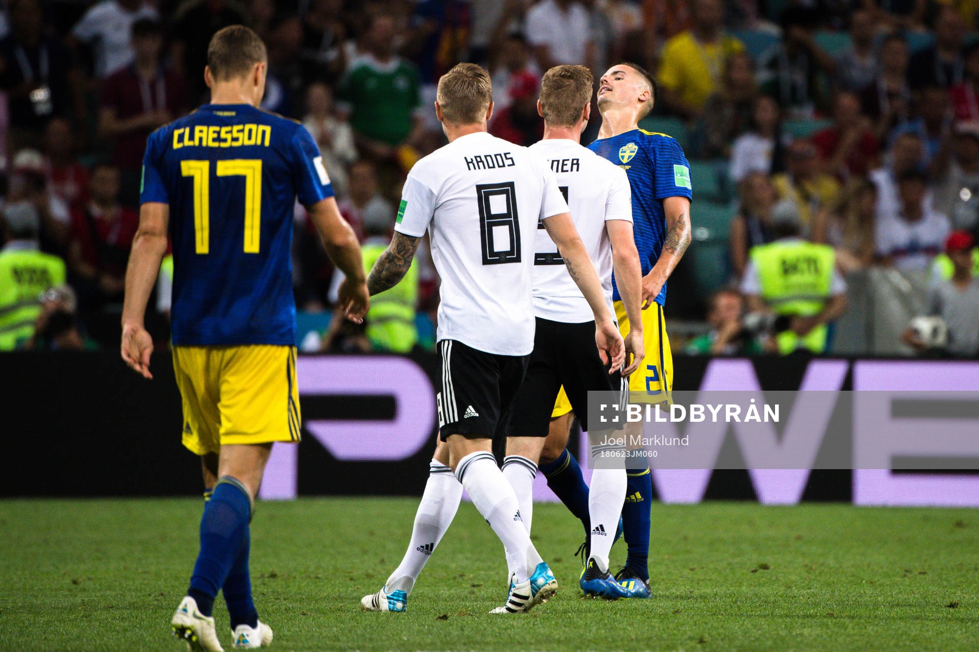 Timo Werner of Germany and Mikael Lustig of Sweden